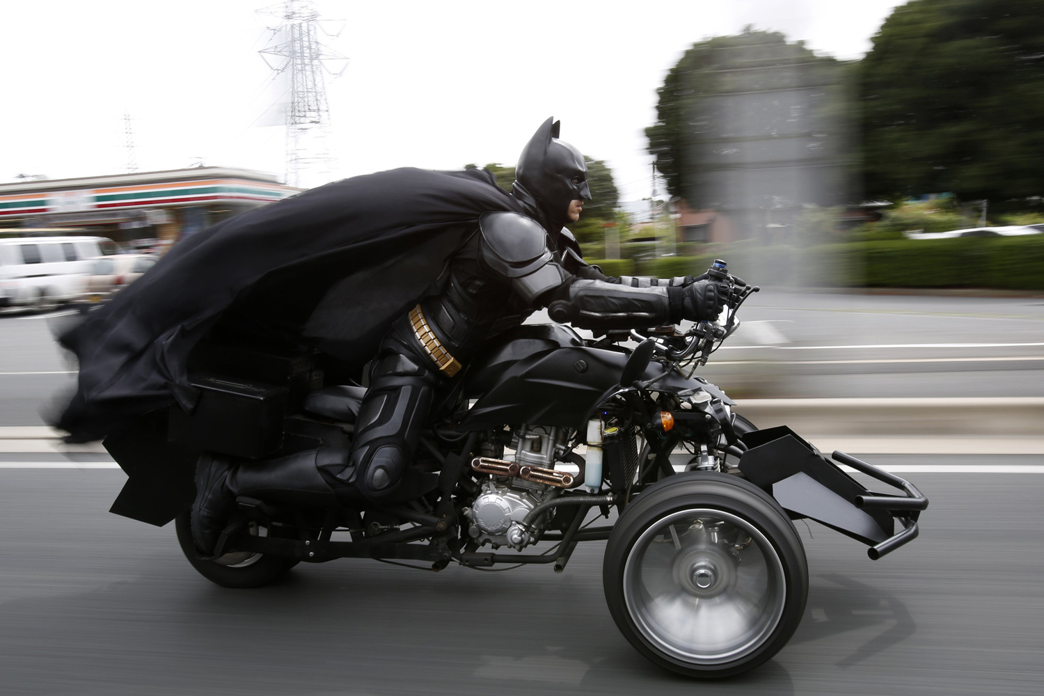 A 41-year-old man going by the name of Chibatman rides his  Chibatpod  on the road in Chiba, east of Tokyo, on Aug. 31, 2014.