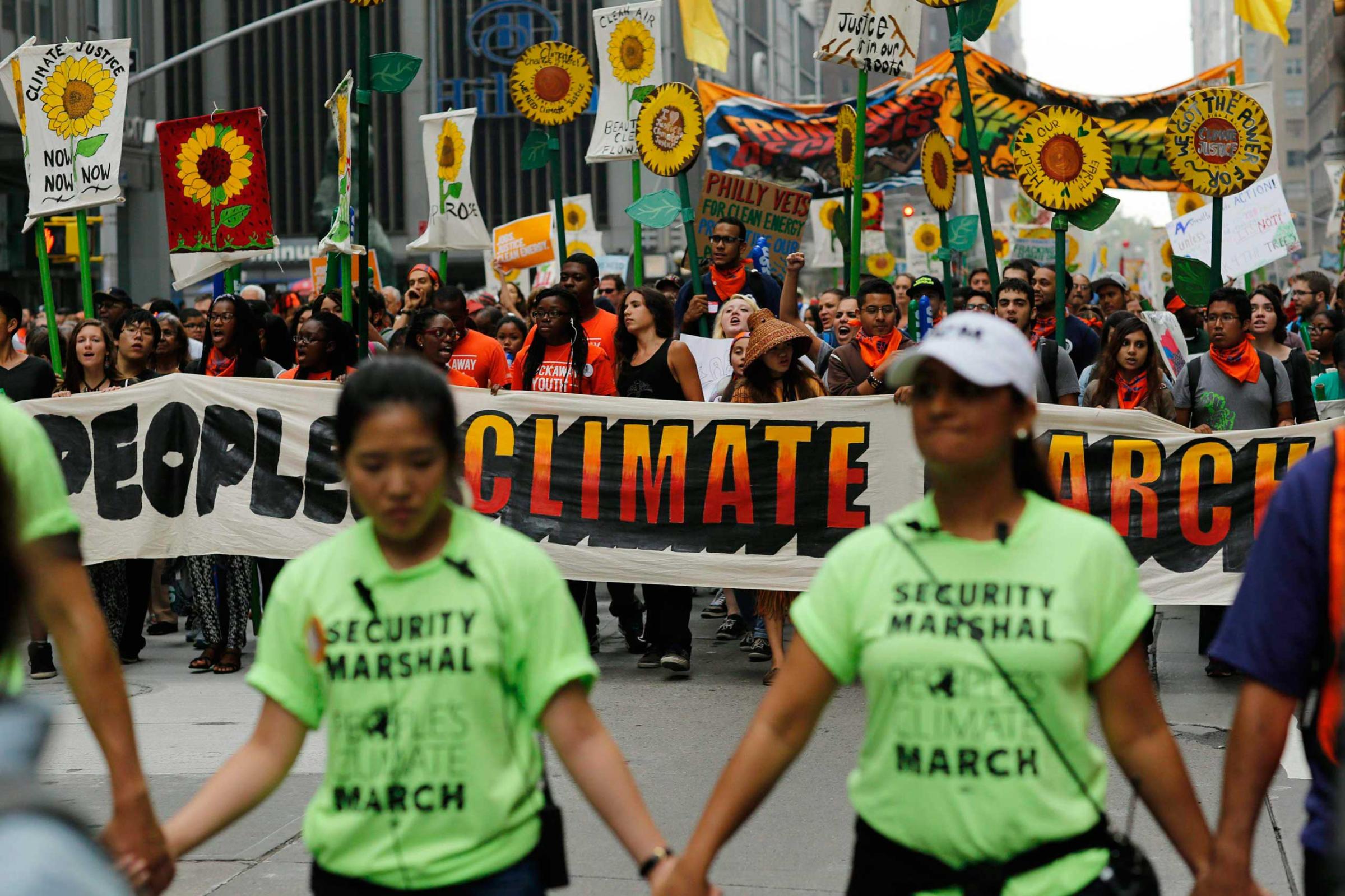 People take part in a march against climate change in New York