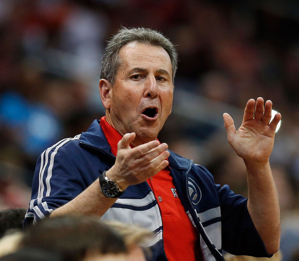 Atlanta Hawks co-owner Bruce Levenson cheers from the stands in the second half of Game 4 of an NBA basketball first-round playoff series against the Indiana Pacers in Atlanta, April 26, 2014. (John Bazemore—AP)