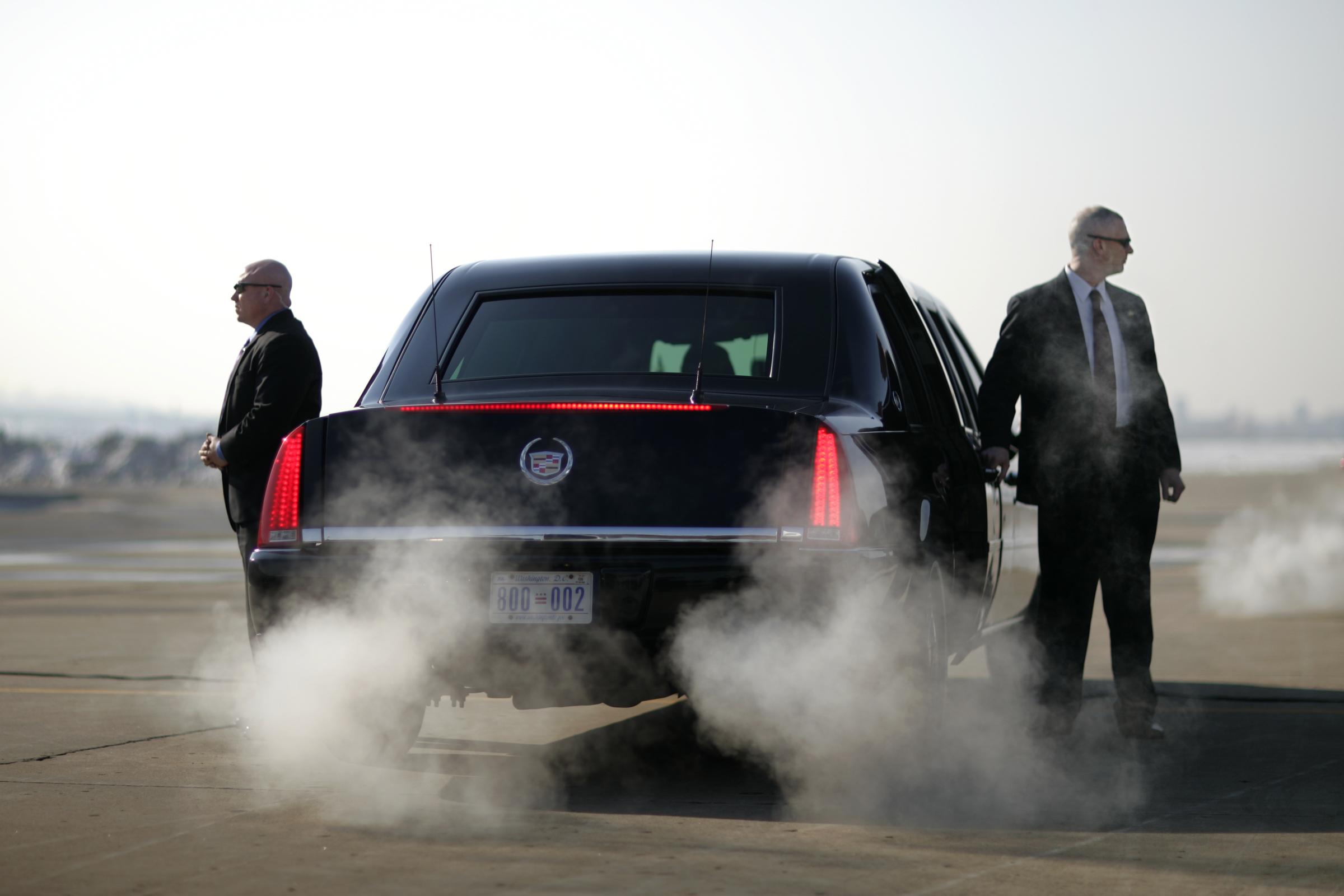 USA - Politics - Secret Service Agents Watch the President's Limousine