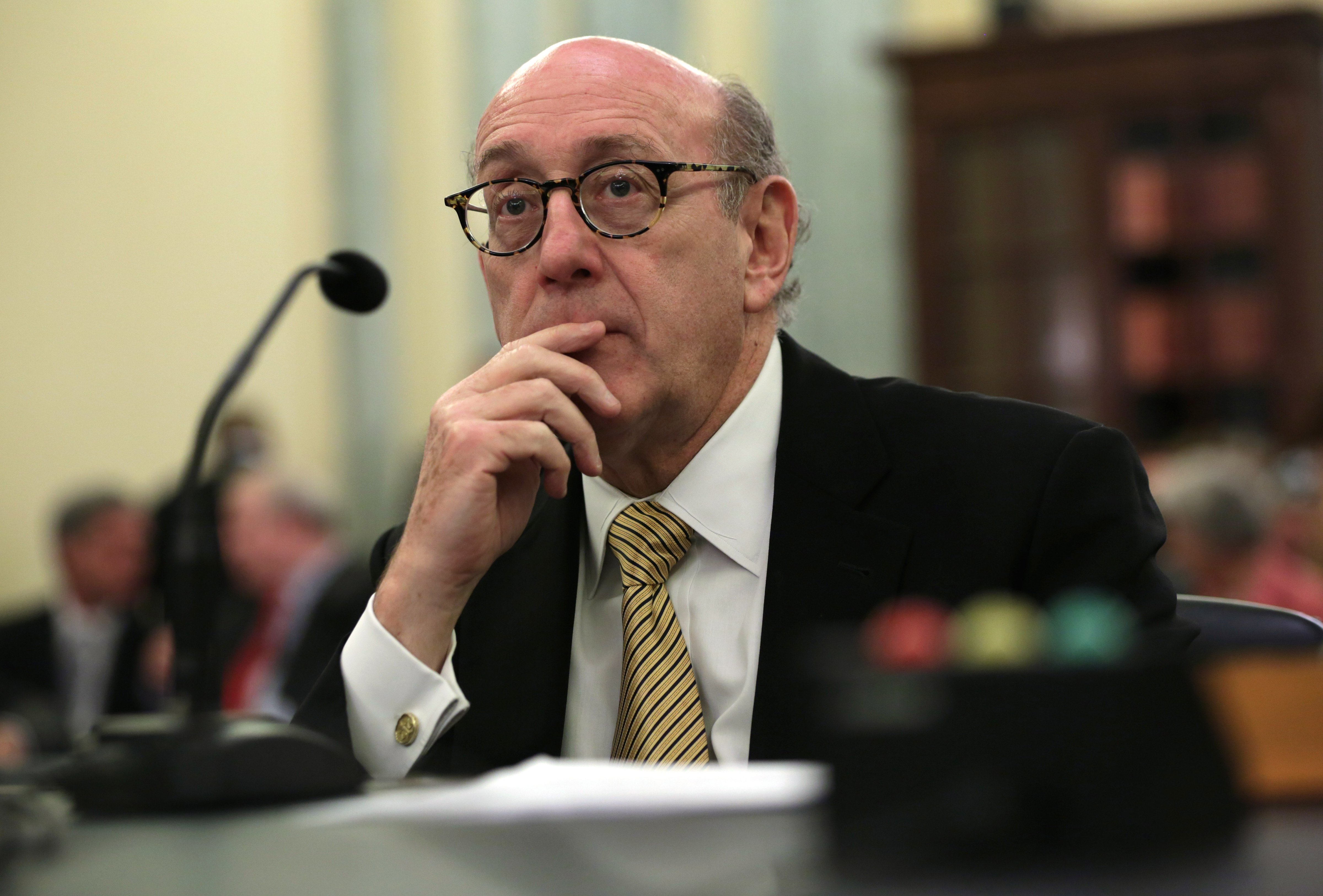 Attorney Kenneth Feinberg testifies during a hearing before the Consumer Protection, Product Safety, and Insurance Subcommittee of the Senate Commerce, Science and Transportation Committee July 17, 2014 on Capitol Hill in Washington, DC. The subcommittee held hearing on "Examining Accountability and Corporate Culture in Wake of the GM Recalls." (Alex Wong—Getty Images)