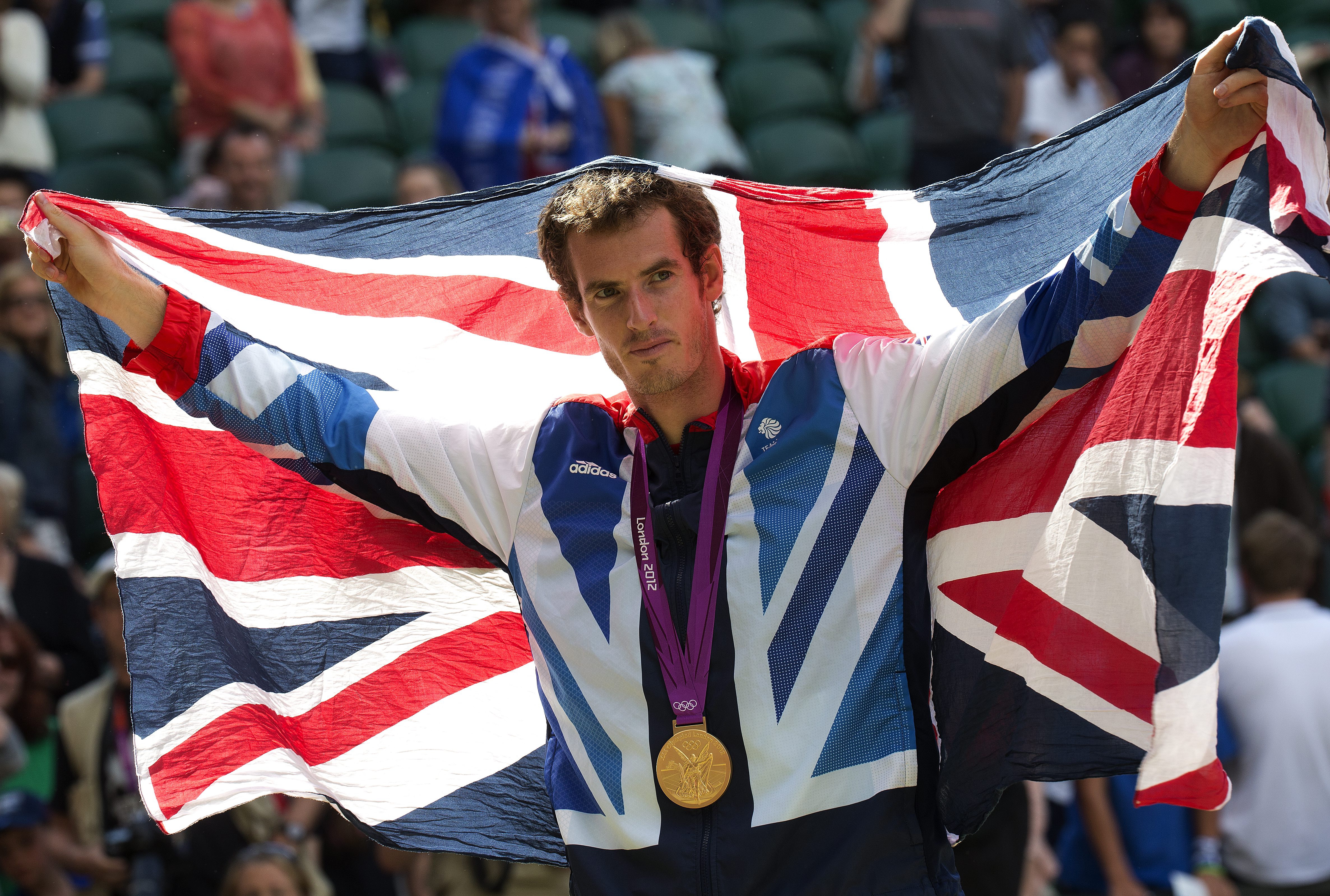 Gold medalist Andy Murray of Great Britain poses after the medal ceremony for the men's singles tennis match at the Olympic Games on Aug. 5, 2012, in London (Professional Sport—Popperfoto/Getty Images)