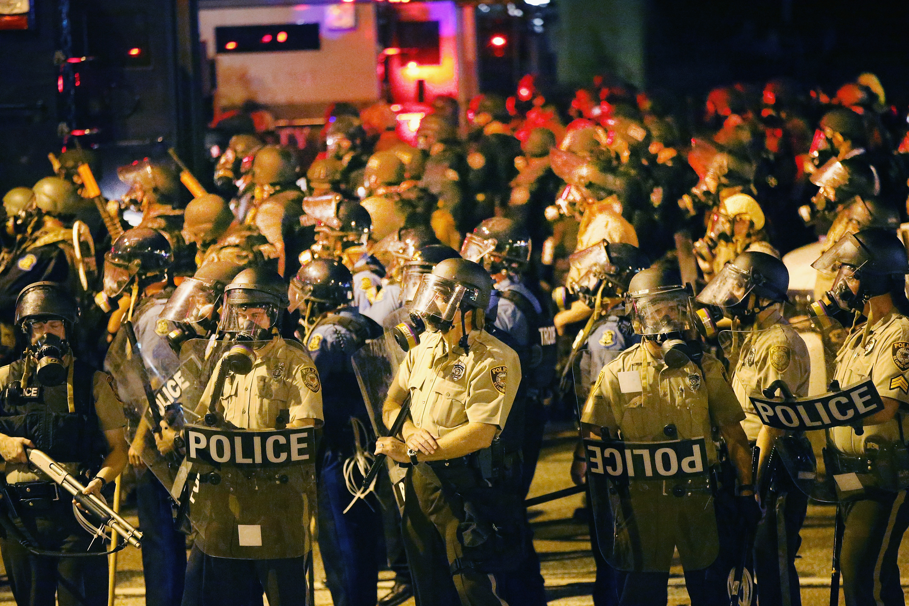 Police advance on demonstrators protesting the killing of teenager Michael Brown on August 17, 2014 in Ferguson, Missouri. (Scott Olson—Getty Images)