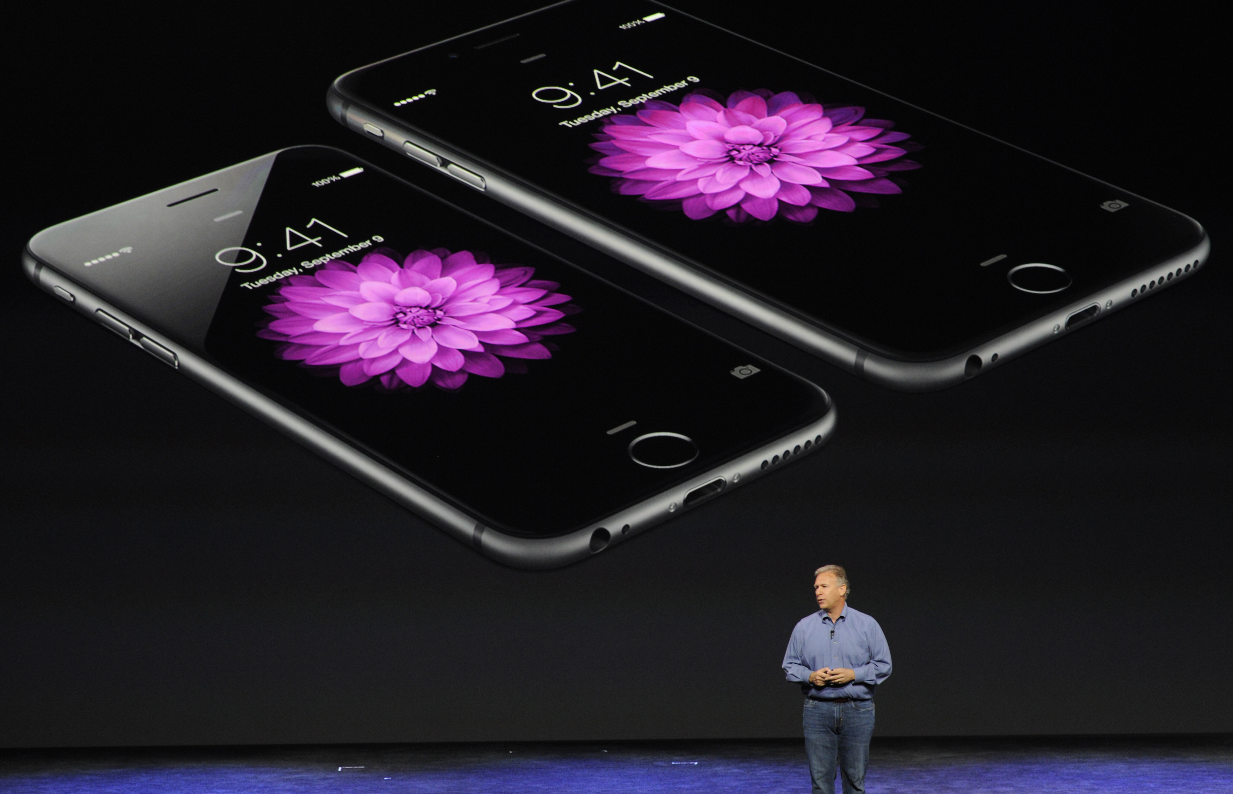 Philip "Phil" Schiller, senior vice president of worldwide marketing at Apple Inc., speaks about the iPhone 6 and iPhone 6 Plus during a product announcement at Flint Center in Cupertino, California, U.S., on Tuesday, Sept. 9, 2014. (Bloomberg—Bloomberg via Getty Images)