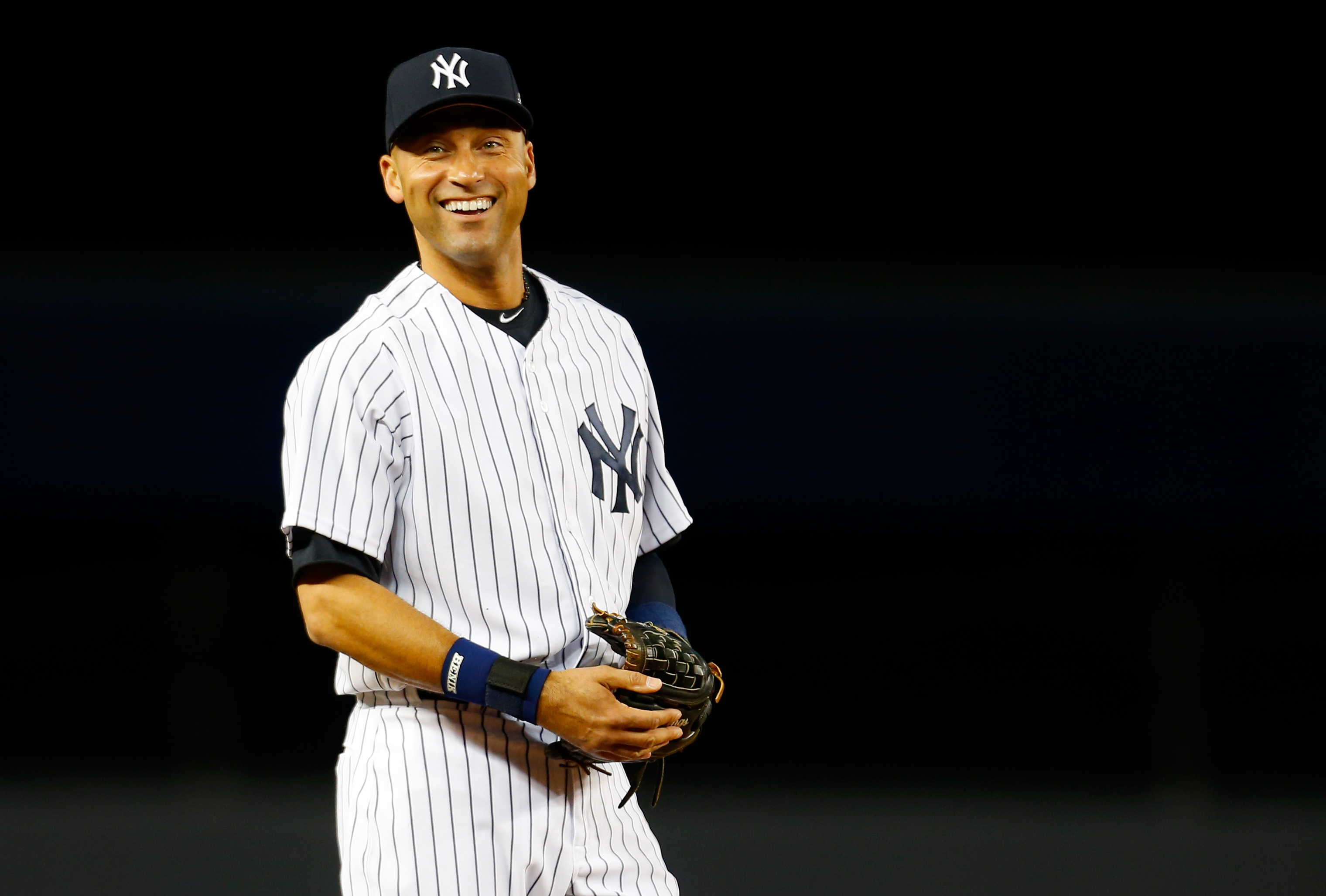 Derek Jeter #2 of the New York Yankees smiles prior to a game against the Baltimore Orioles at Yankee Stadium on September 22, 2014. (Mike Stobe&mdash;Getty Images)