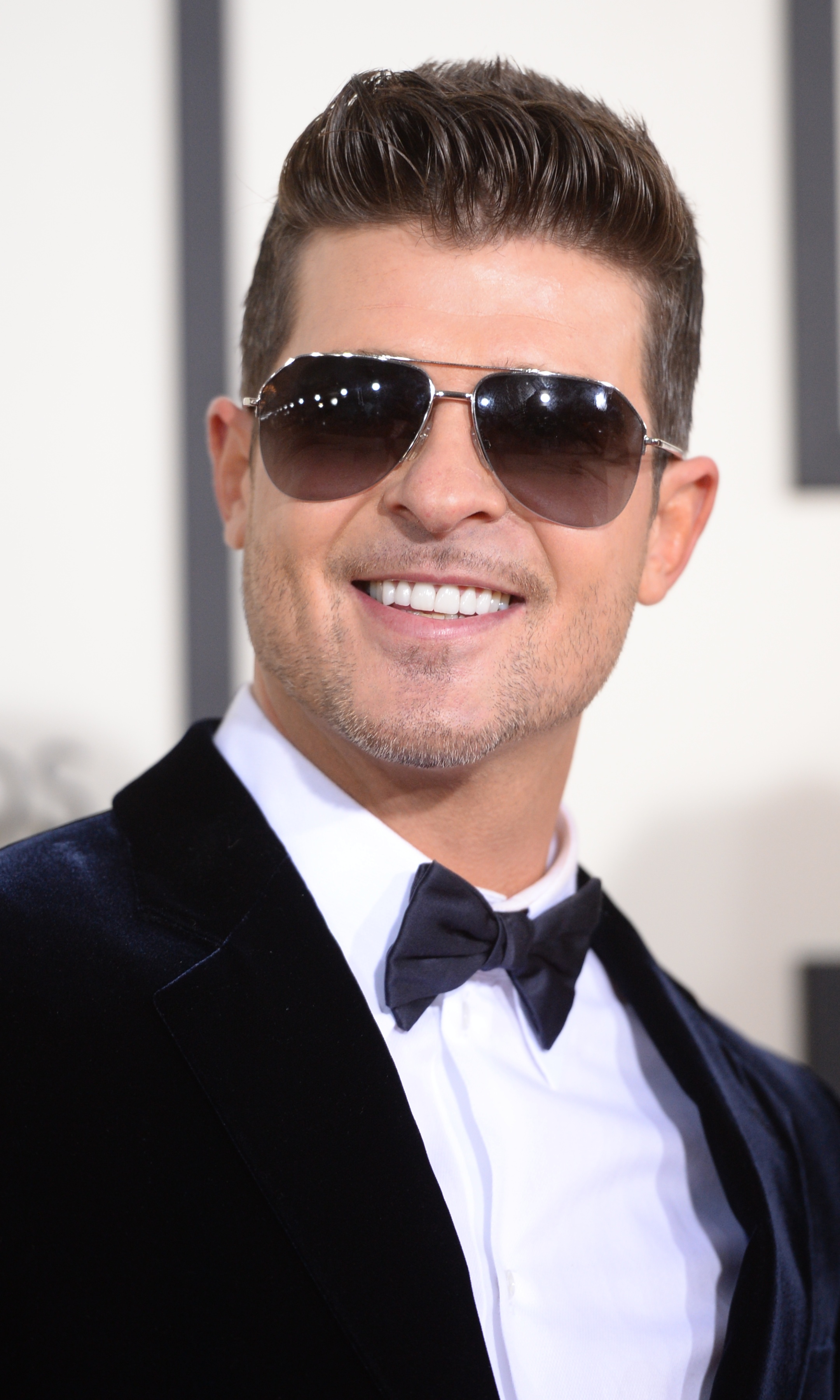 Robin Thicke arrives on the red carpet for the 56th Grammy Awards in Los Angeles on Jan. 26, 2014 (Robyn Beck—AFP/Getty Images)