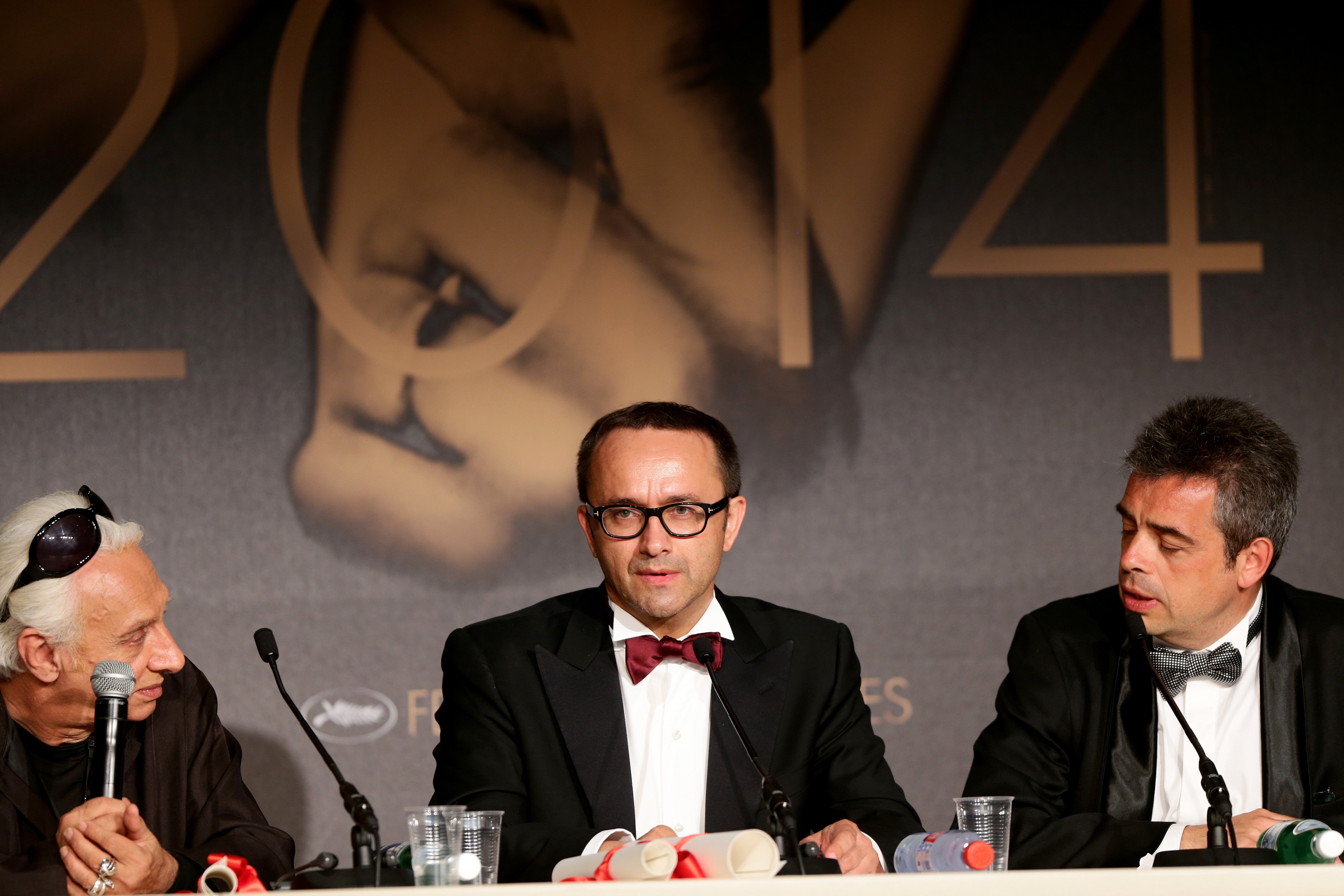 Russian director and screenwriter Andrey Zvyagintsev, center, winner of the best screenplay at the Cannes Film Festival for his film <i>Leviathan</i>, attends a press conference in Cannes, France, on May 24, 2014 (Vittorio Zunino Celotto—Getty)