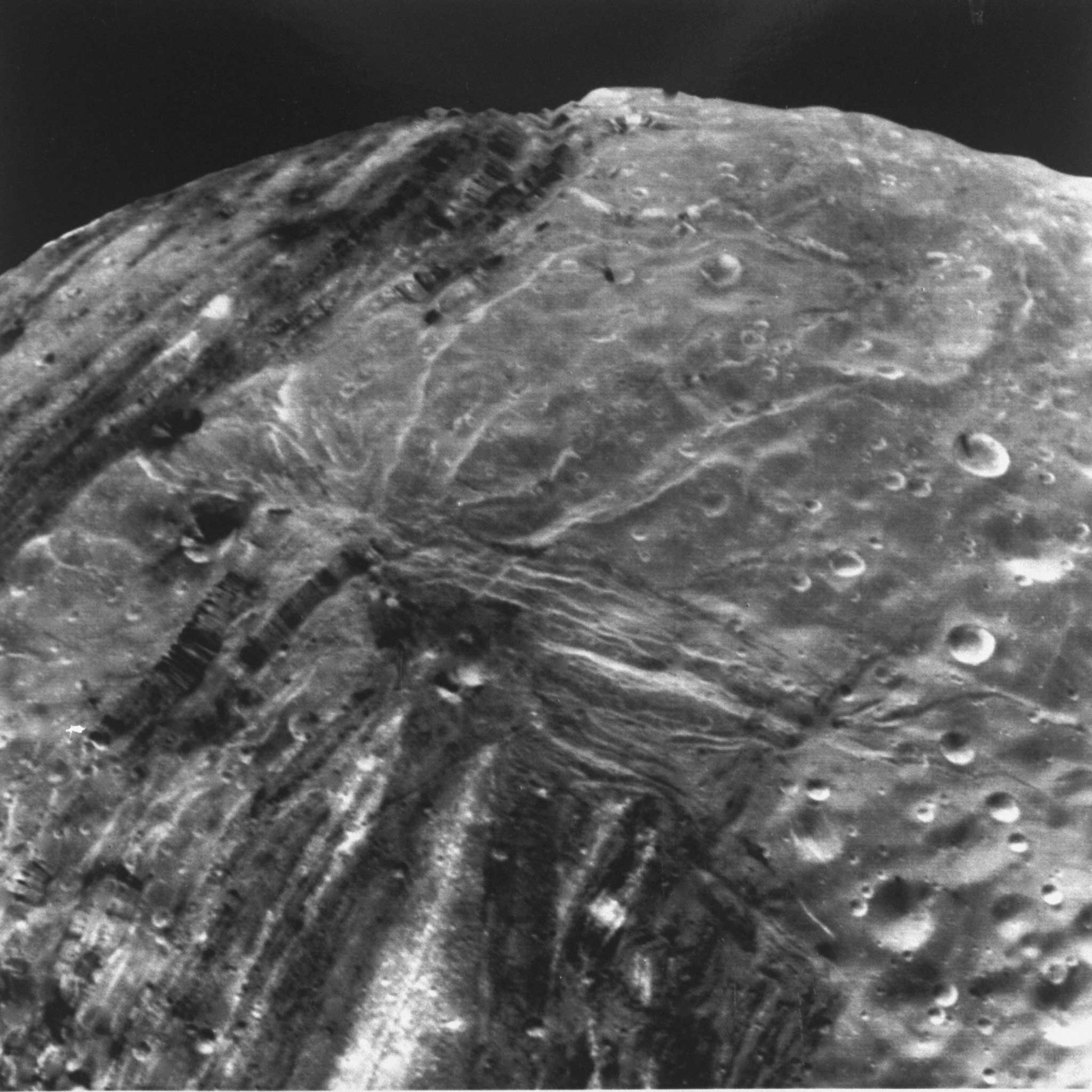 High-resolution image of the surface of Miranda, one of Uranus' largest moons, taken from the Voyager 2 spacecraft (NASA)