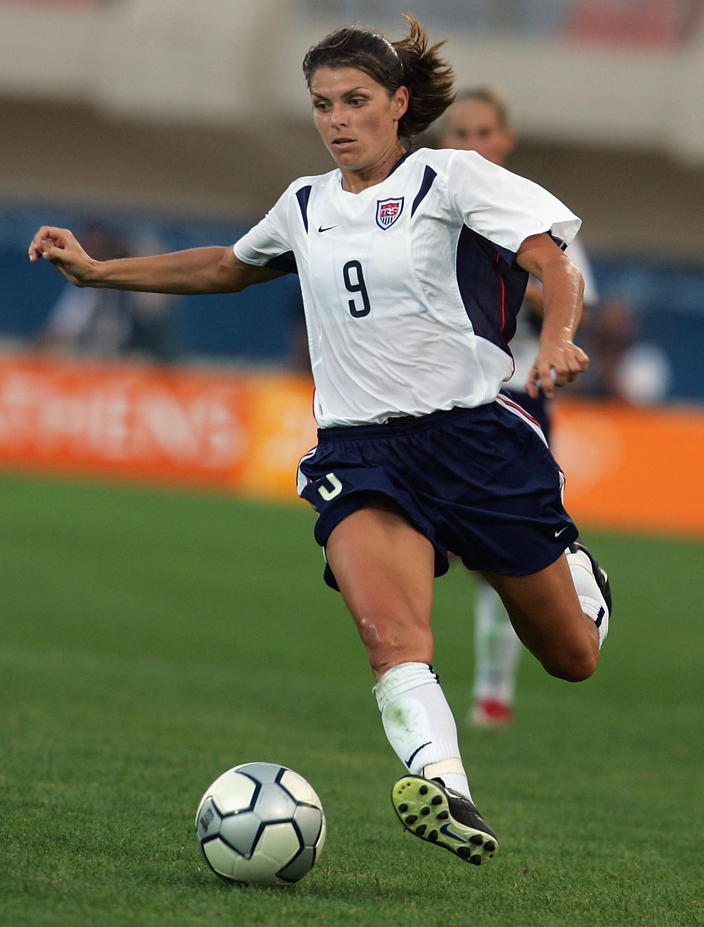 Mia Hamm #9 of the United States dribbles during the women's soccer semifinal match between USA and Germany on August 23, 2004 during the Athens 2004 Summer Olympic Games at Pankritio Stadium in Heraklio, Greece. (Scott Barbour&mdash;Getty Images)