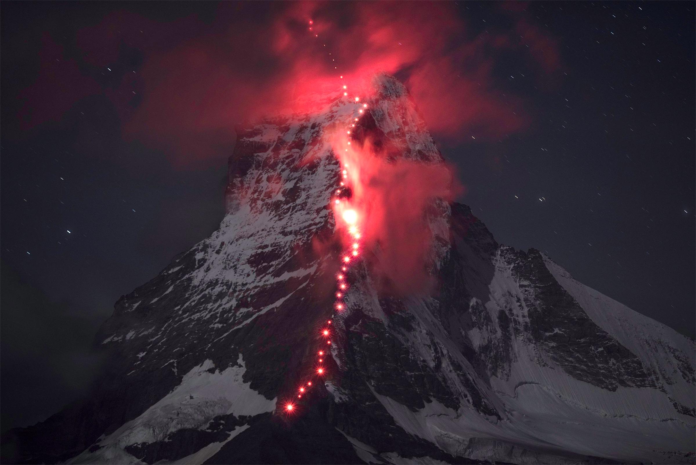 In preparation for the 150th anniversary of the first ascent of the Matterhorn, Swiss mountain sports specialist Mammut and mountain guides from the village of Zermatt transformed the spectacular summit into a shining stone icon as an anniversary gift to Zermatt on Sept. 16, 2014.