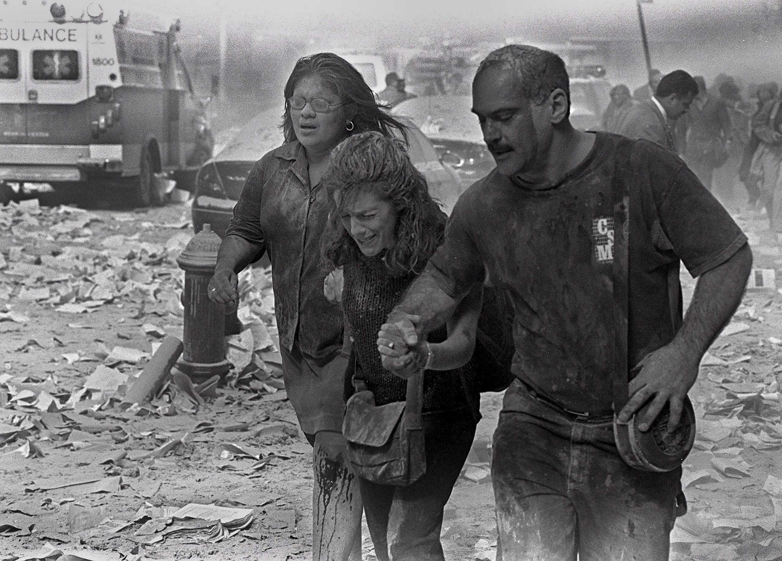 Robert Clark, photographer
                              
                               When I look at all the pictures from the coverage of 9/11, I keep coming back to this one. I think that this is a very powerful image, it seems to tell the whole story of the people who had to run for their lives. It is a stripped down image of the event, I see pure emotion, fear, tragedy. It some how seems to be very honest, the fact that it is in black &amp; white reminds me of the way lower Manhattan looked that day. It shows the damage in human terms, my image (Robert Clark made photographs on 9/11) is a bit detached and an over-all shoot of the event, the other image is one that shows fear, pain, lose. The human factor.
