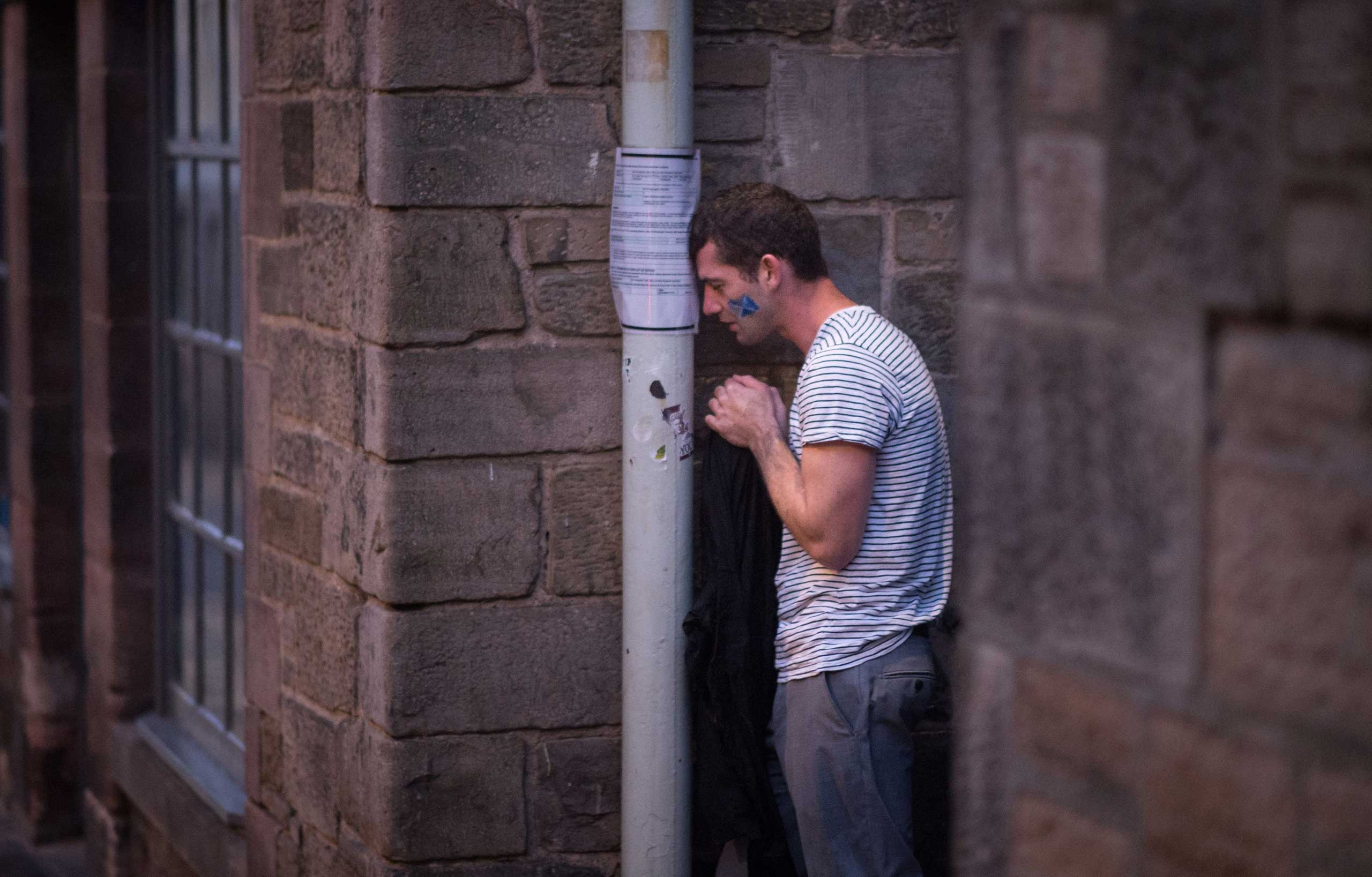 Sept. 19, 2014. A dejected  Yes  supporter in Edinburgh makes his way home in the early hours after Scotland voted to reject independence and remain part of the United Kingdom.
