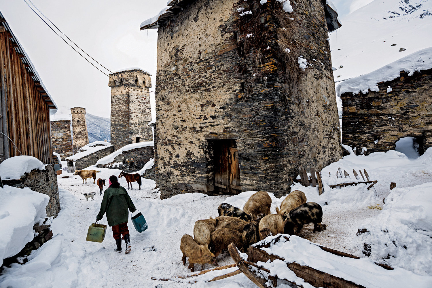 Some 200 towers, like these in Ushguli—built mainly from the 9th into the 13th centuries for shelter during wars, raids, and blood feuds—remain in Svaneti. Now they’re used to store hay and grain for farm animals, including pigs.