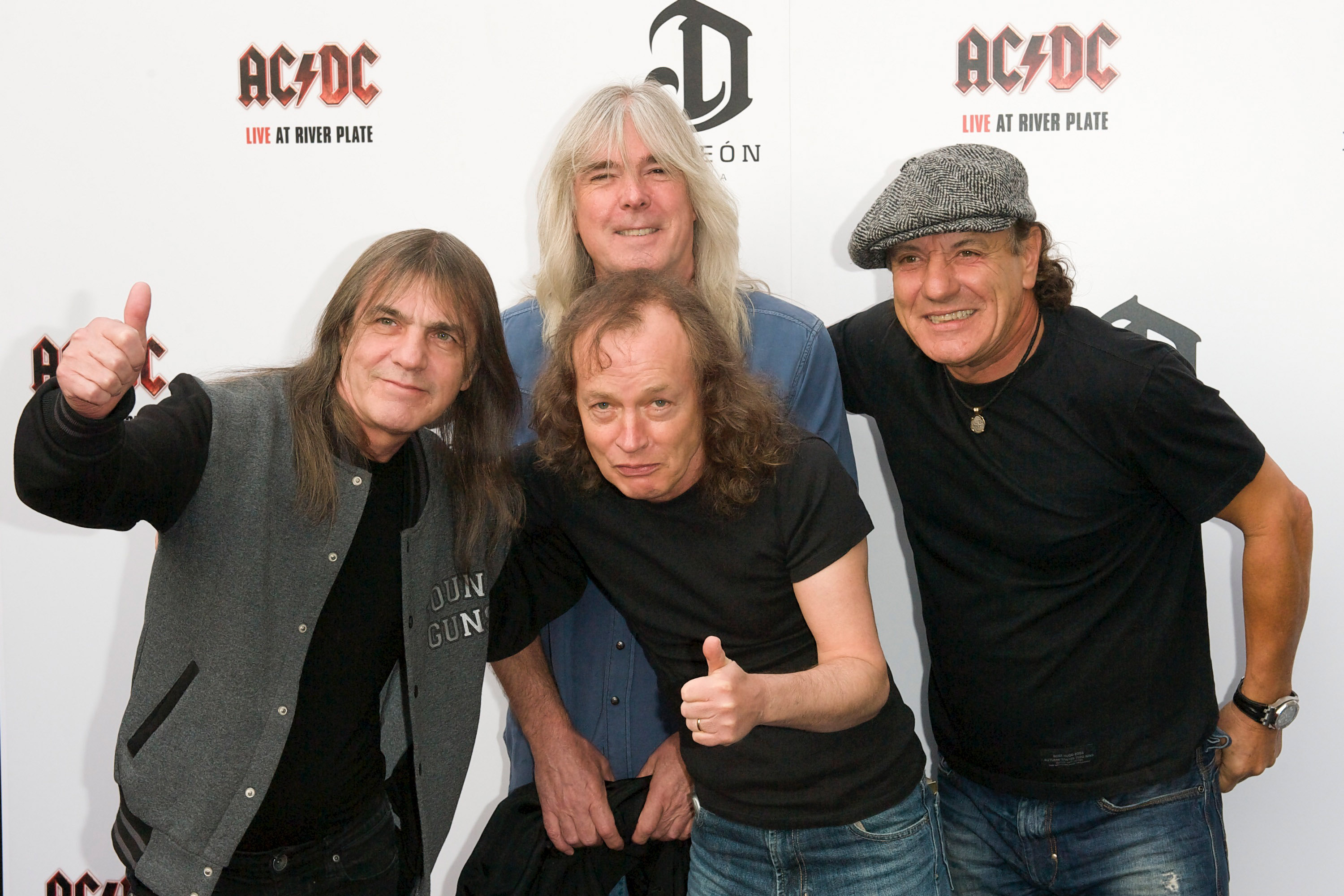 AC/DC band members, from left to right,  Malcolm Young, Cliff Williams, Angus Young and Brian Johnson attend the exclusive world premiere of their album <i>Live at River Plate</i> in London on May 6, 2011 (Jorge Herrera—WireImage/Getty Images)