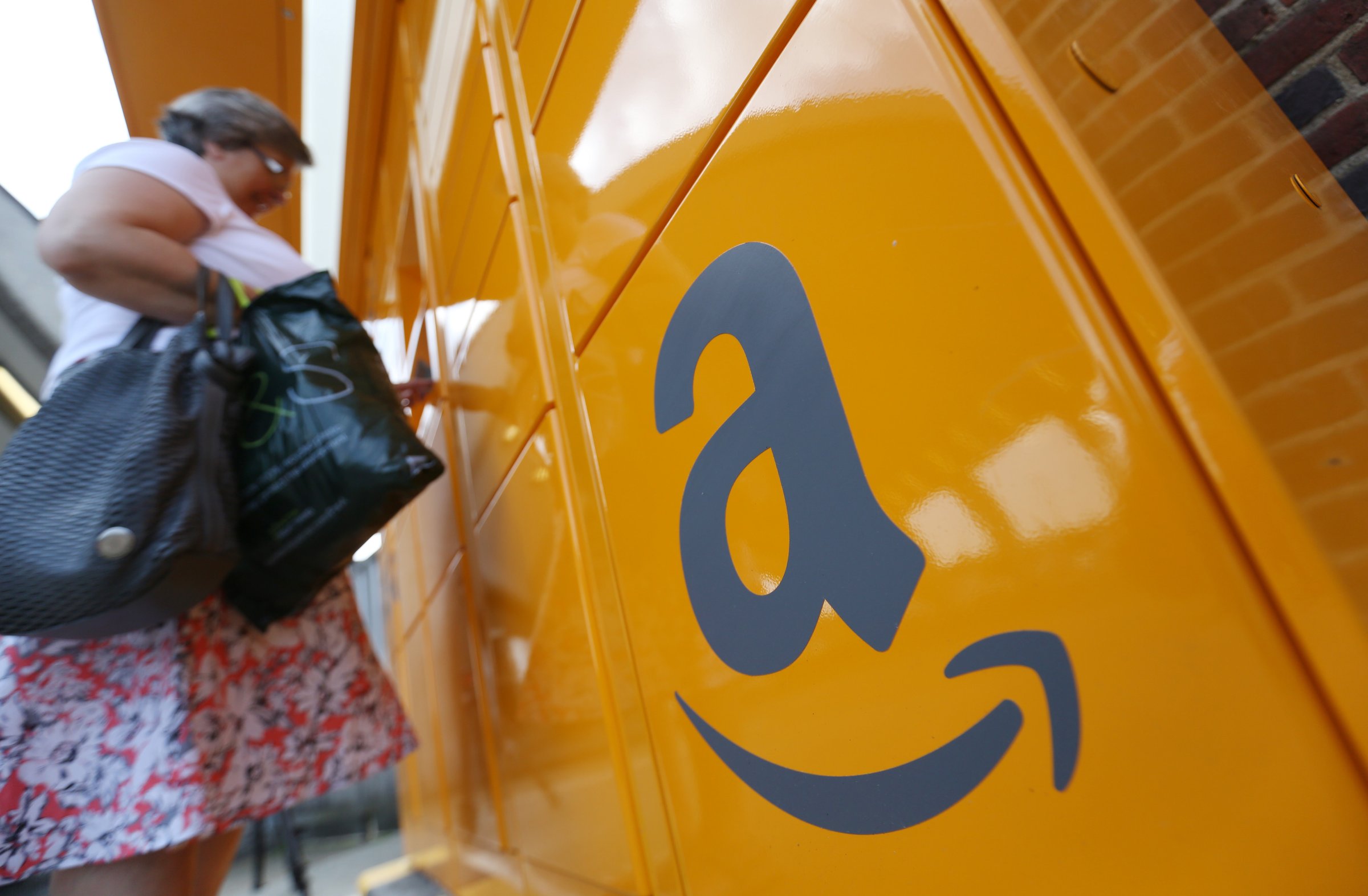 Customers Collect Online Orders From An Amazon.com Inc. Locker