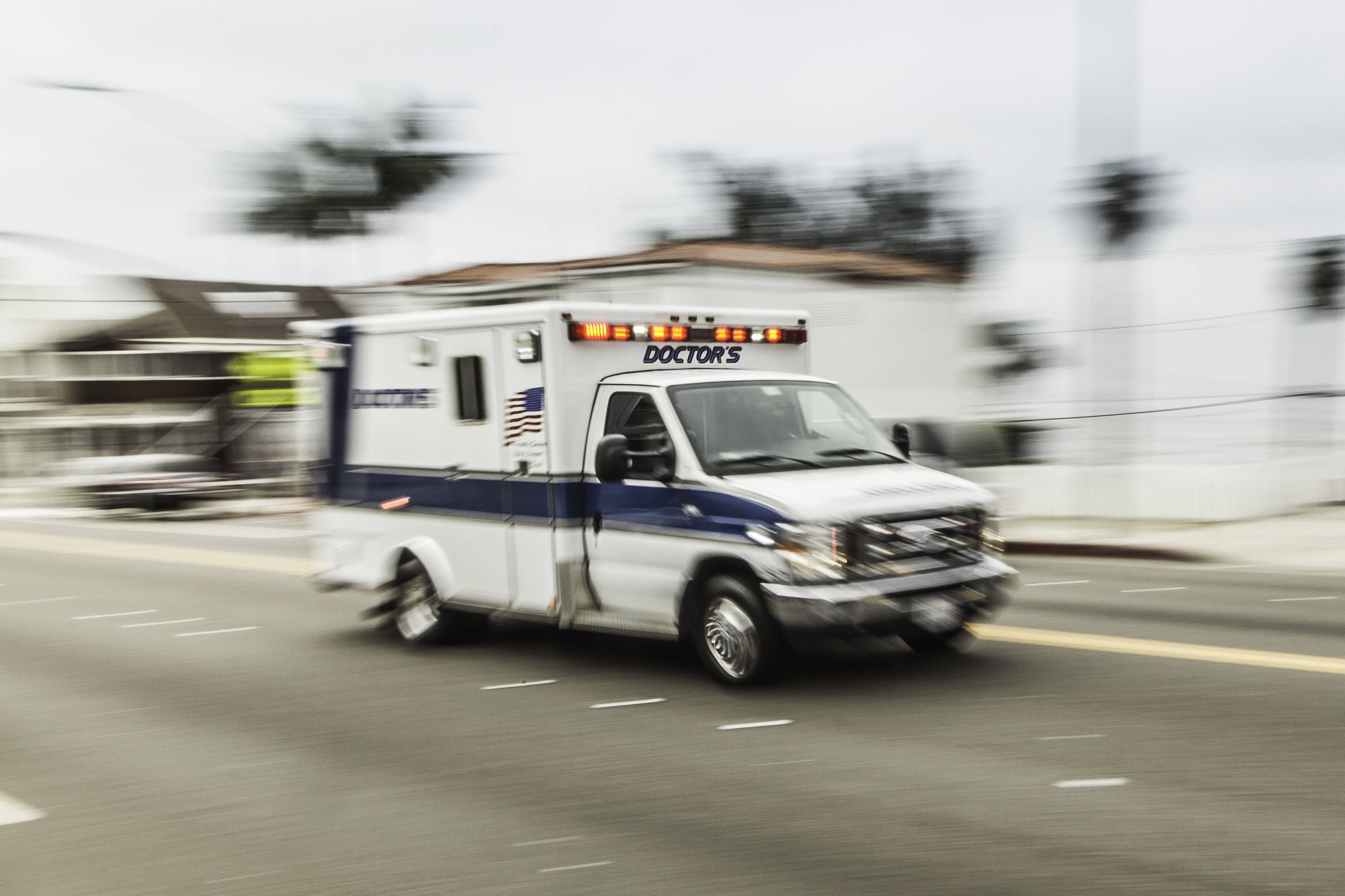 Blurred motion shot of speeding ambulance