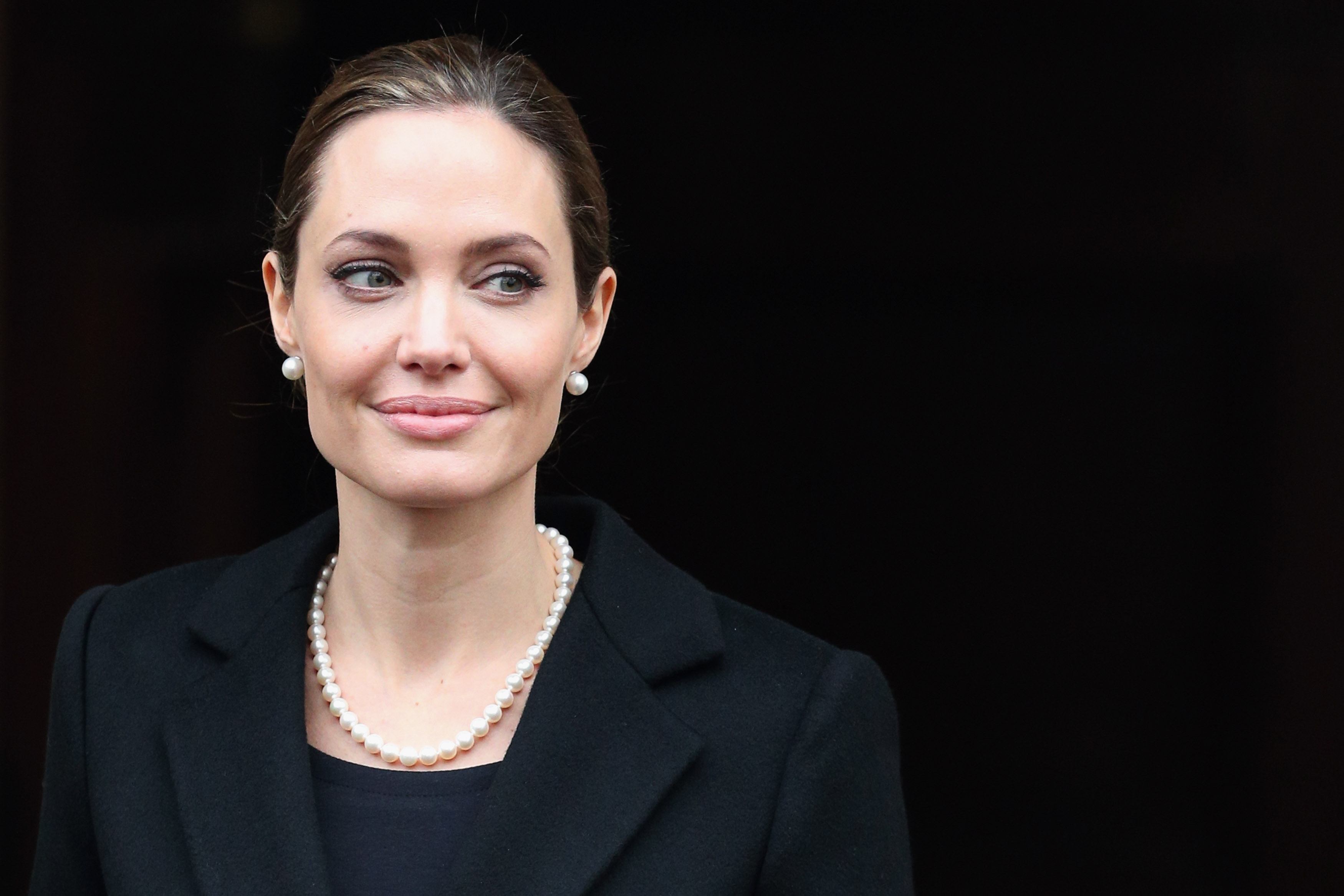 Actress Angelina Jolie leaves Lancaster House after attending the G8 Foreign Minsters' conference on April 11, 2013 in London. (Oli Scarff—Getty Images)
