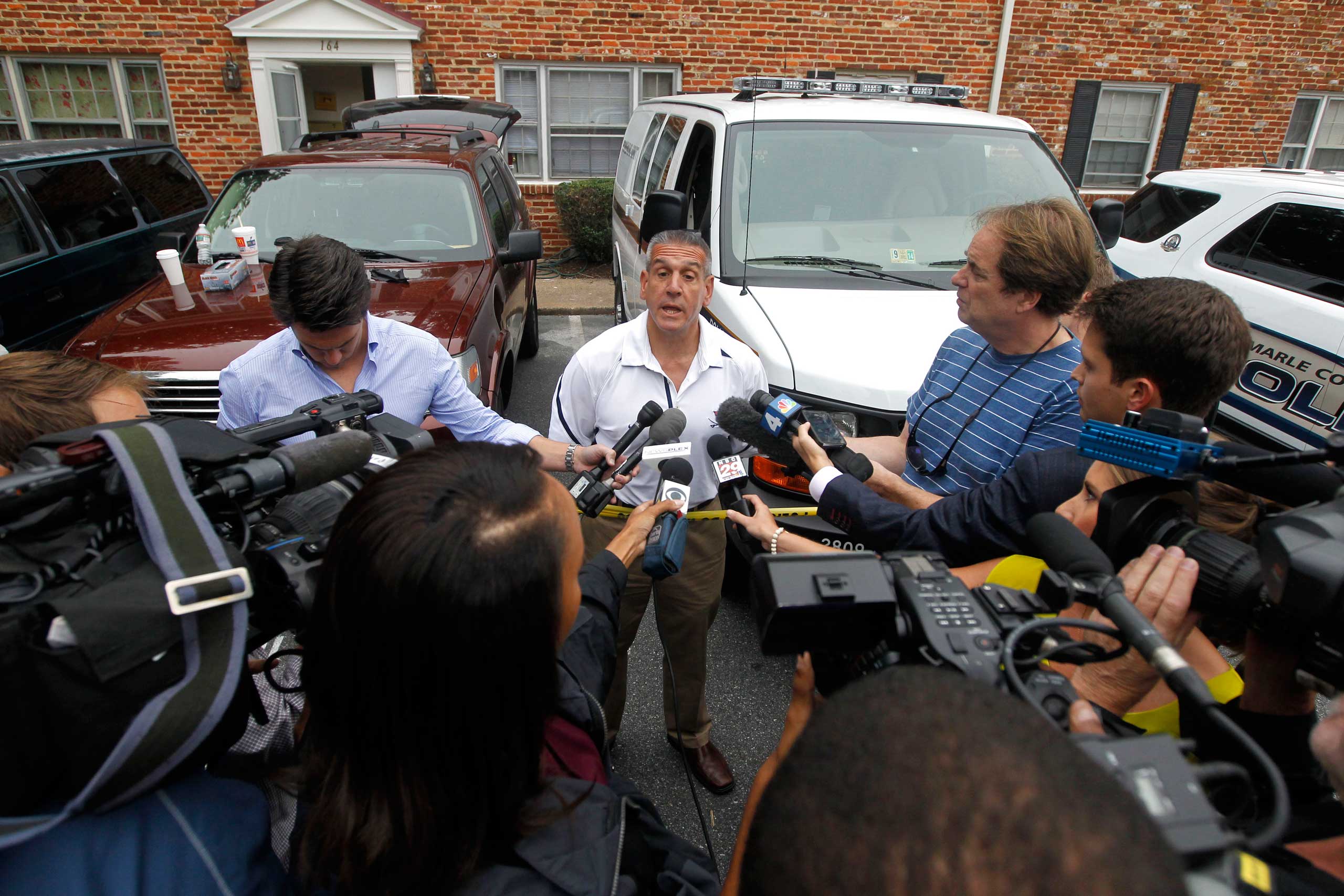 Police Chief Timothy J. Longo speaks with reporters at a Hessian Hills apartment as the search for missing University of Virginia student Hannah Graham continues, Sept. 19, 2014 in Charlottesville, Va. (Ryan M. Kelly—AP)