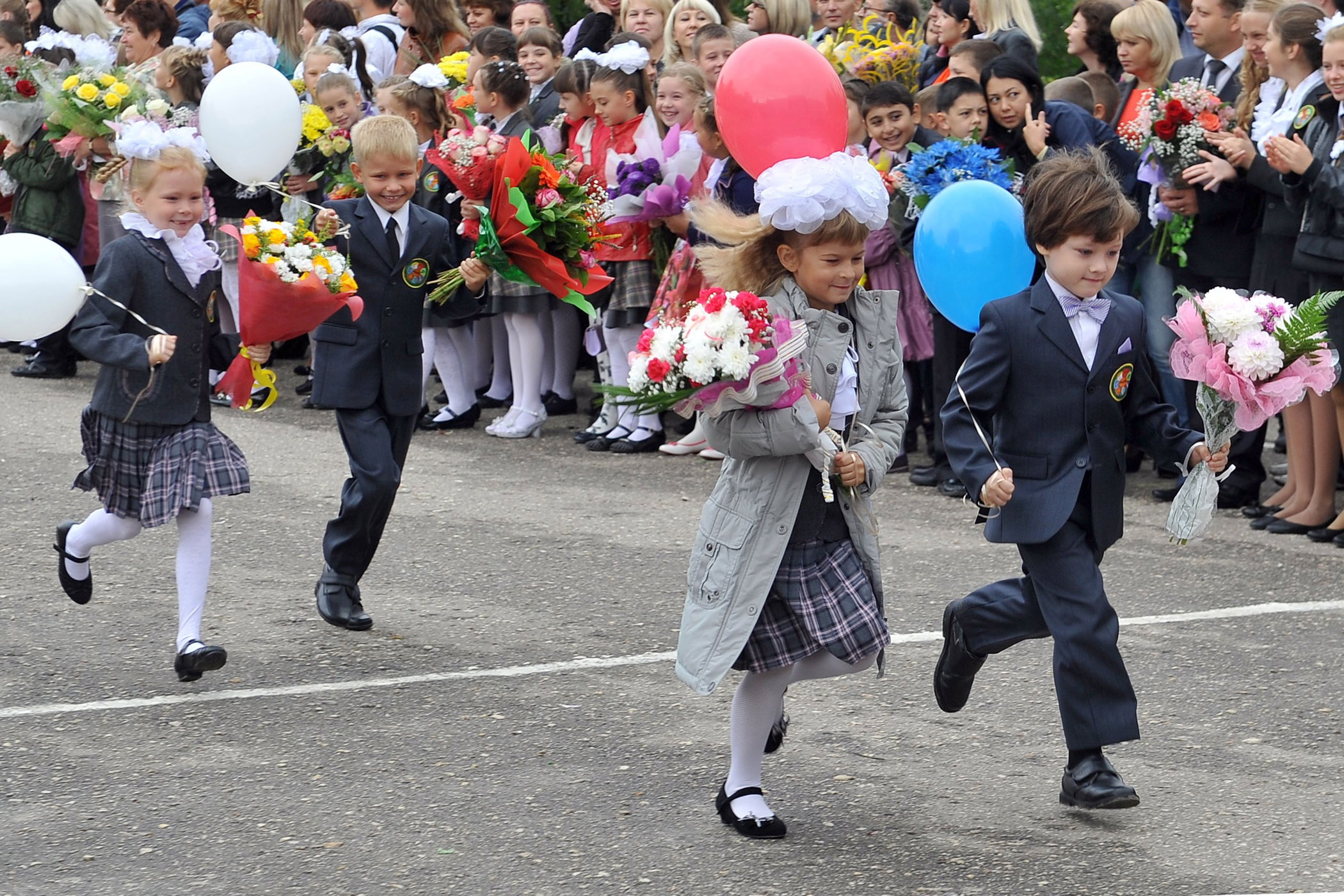 First grade students line up at school during the start of a new school year on Knowledge Day in Ryazan, Russia.