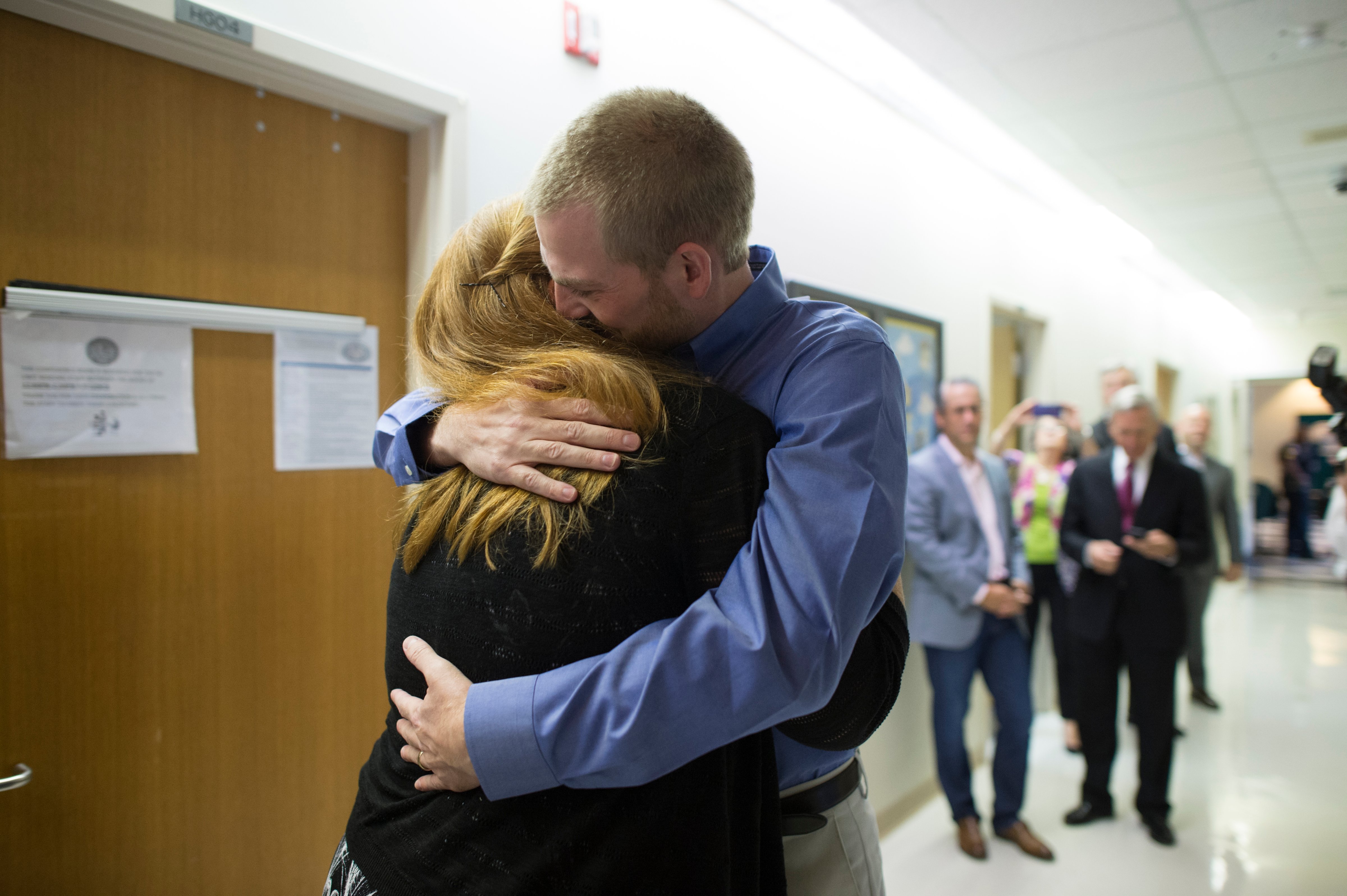 Dr. Kent Brantly hugs his wife Amber after being discharged from Emory University Hospital (David Morrison&mdash;© 2014 Samaritan's Purse)
