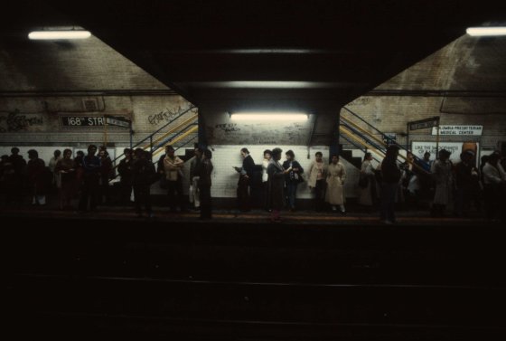 Commuters wait for a train at 168th Street station in Manhattan, 1981.