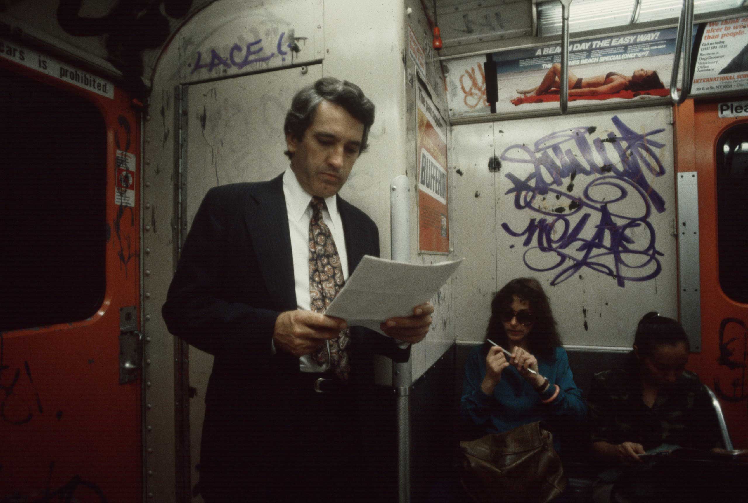 A commuter reading, 1981.