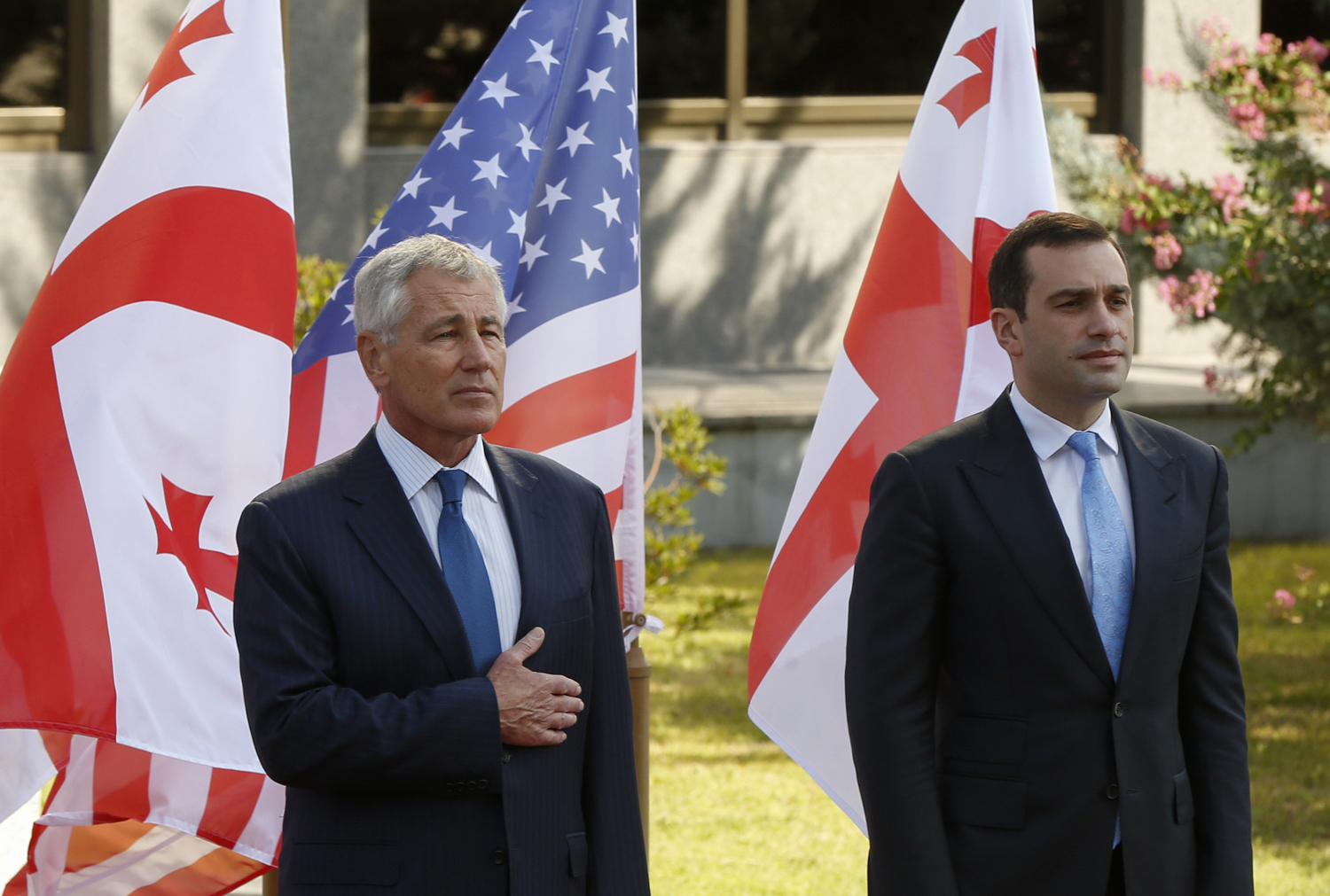 Georgia's Defence Minister Irakly Alasania (R) and U.S. Defense Secretary Chuck Hagel attend an official welcoming ceremony in Tbilisi on September 7, 2014. (David Mdzinarishvili —Reuters)