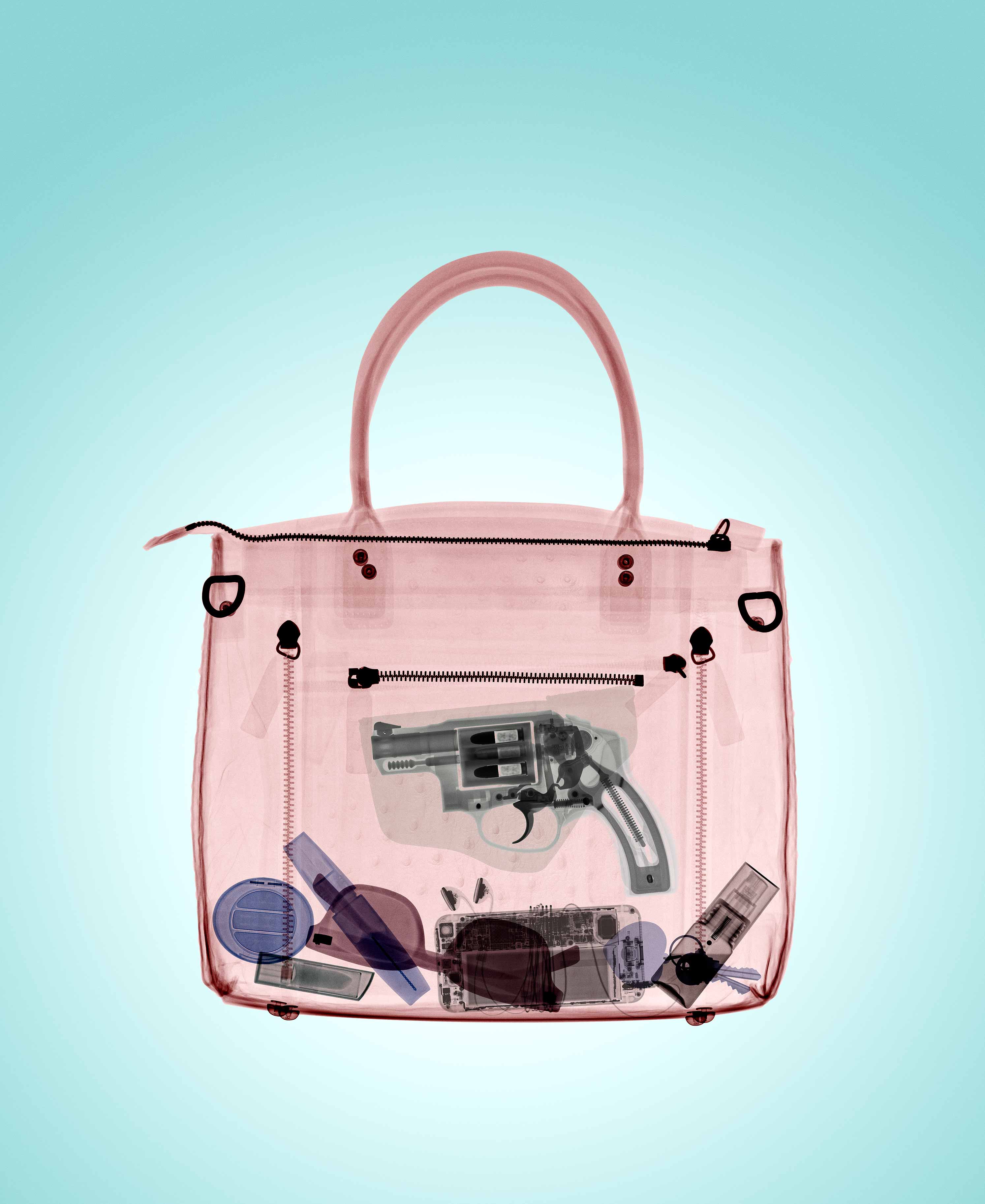 Companies are courting the growing ranks of women carrying concealed weapons with products like this handbag with a hidden gun pouch (Photo-illustration by David Arky for TIME)