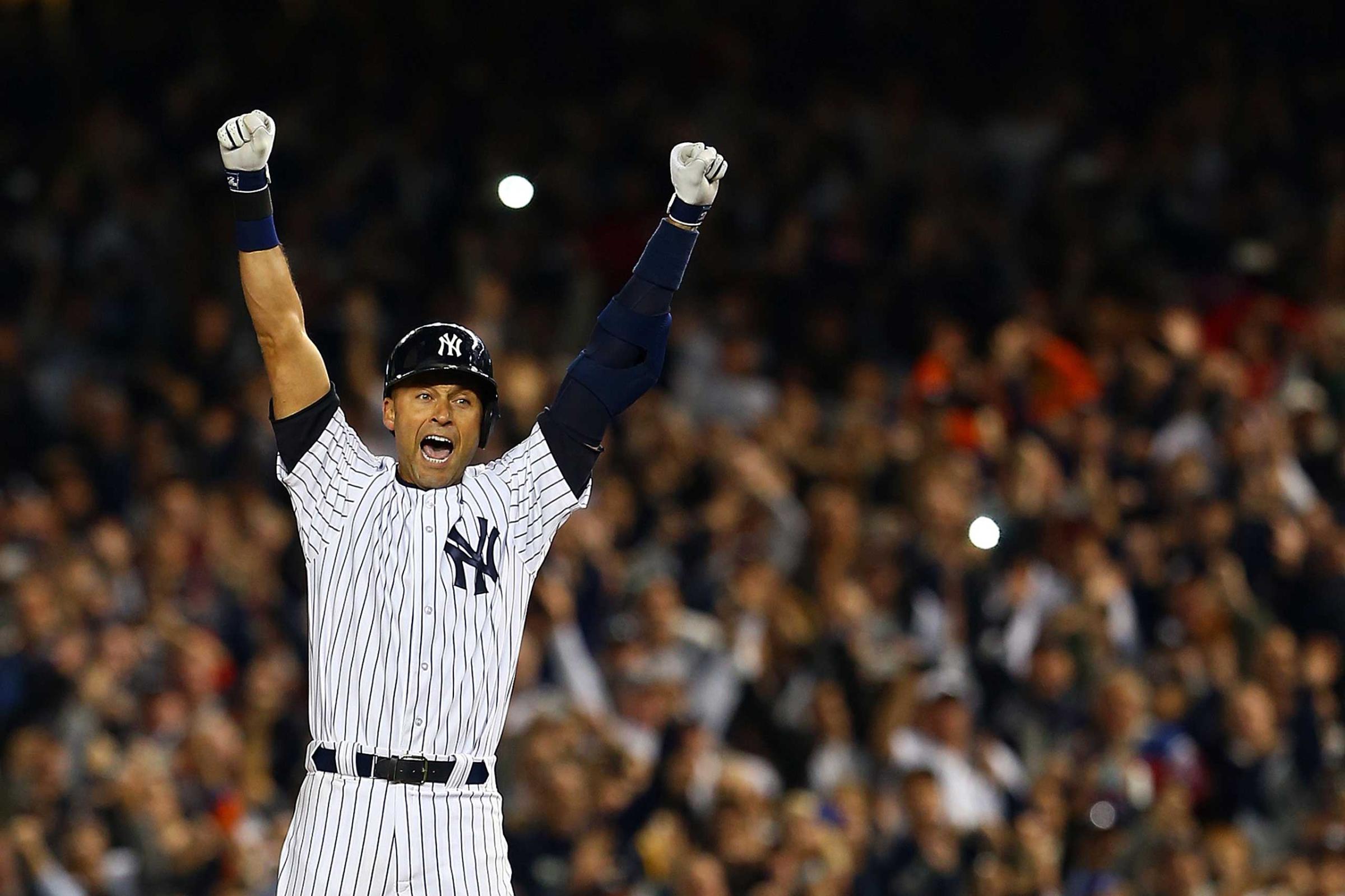 Derek Jeter celebrates after a game winning RBI hit in the ninth inning against the Baltimore Orioles in his last game ever at Yankee Stadium on Sept. 25, 2014 .