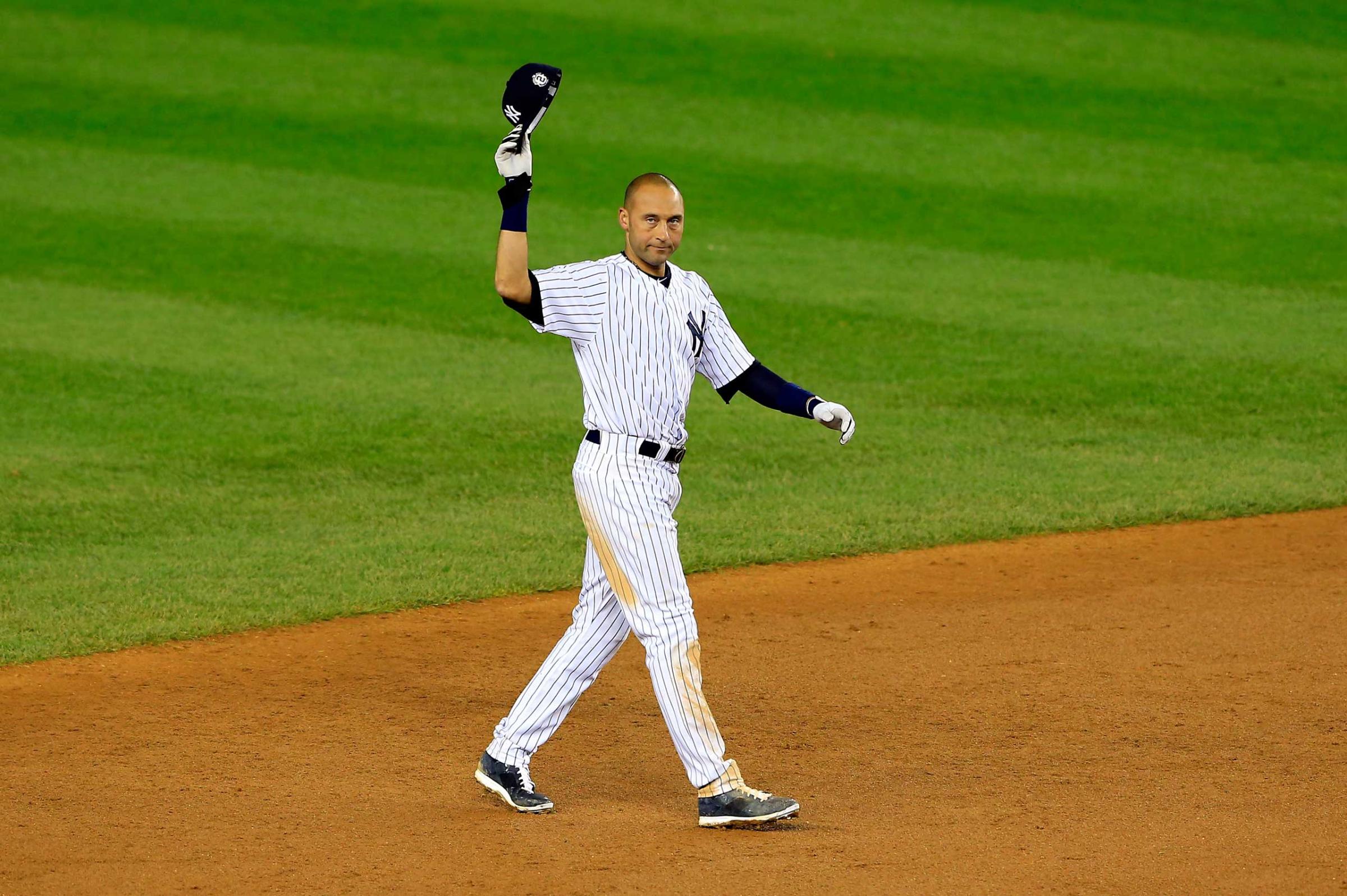 Derek Jeter gestures to the fans after a game winning RBI hit in the ninth inning against the Baltimore Orioles in his last game ever at Yankee Stadium on Sept. 25, 2014.