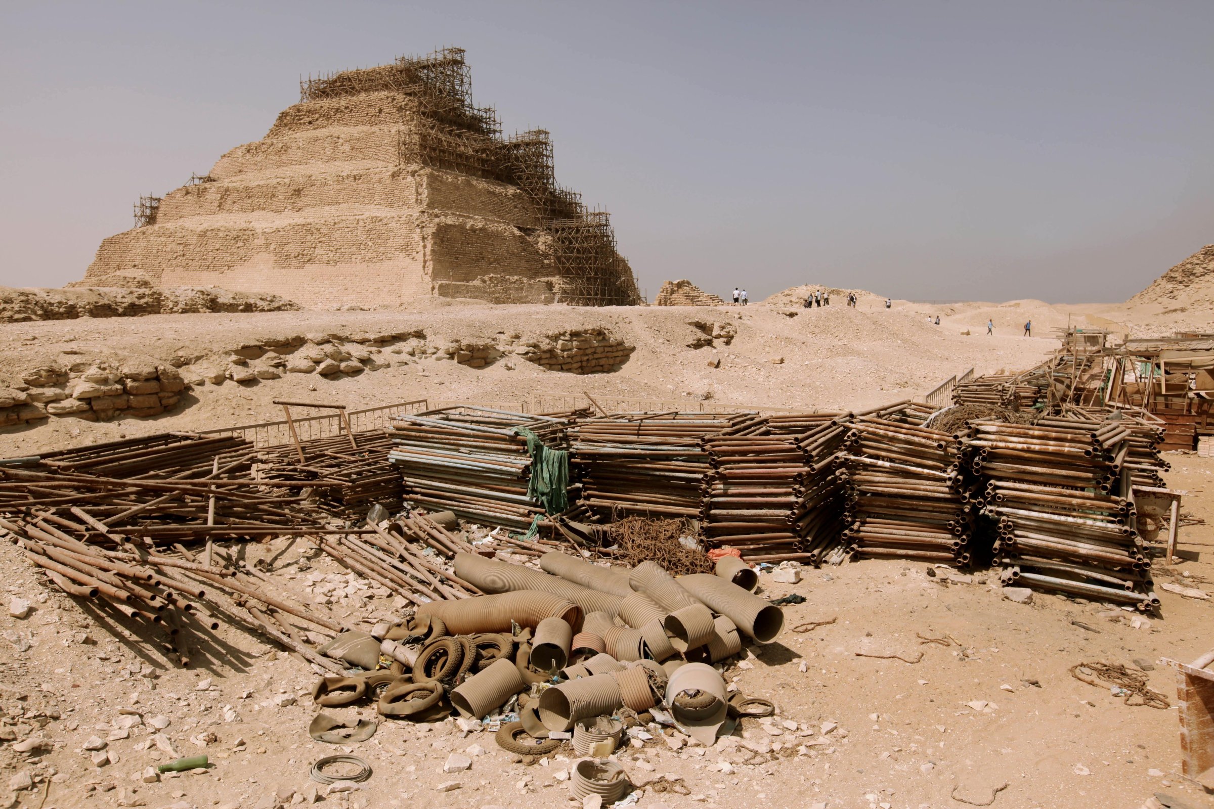 Building materials gather dust at the foot of the Djoser Pyramid in Saqqara, Egypt on Sept. 16, 2014.
