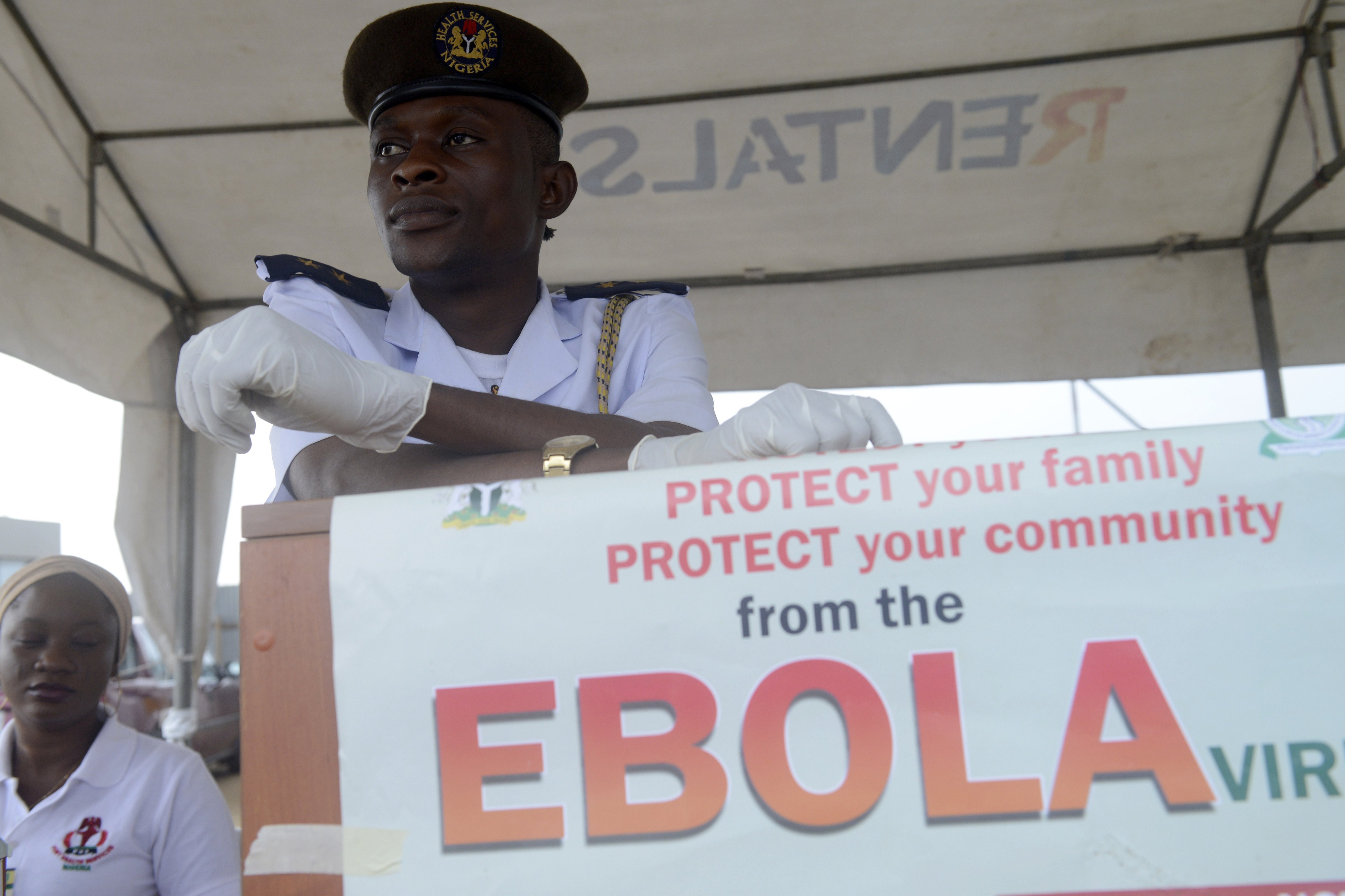 A health official waits to screen for the ebola virus Muslim faithfuls on pilgrimage to Mecca on September 19, 2014 at the Murtala Mohammed International Airport in Lagos. (Pius Utomi Ekpei&mdash;AFP/Getty Images)