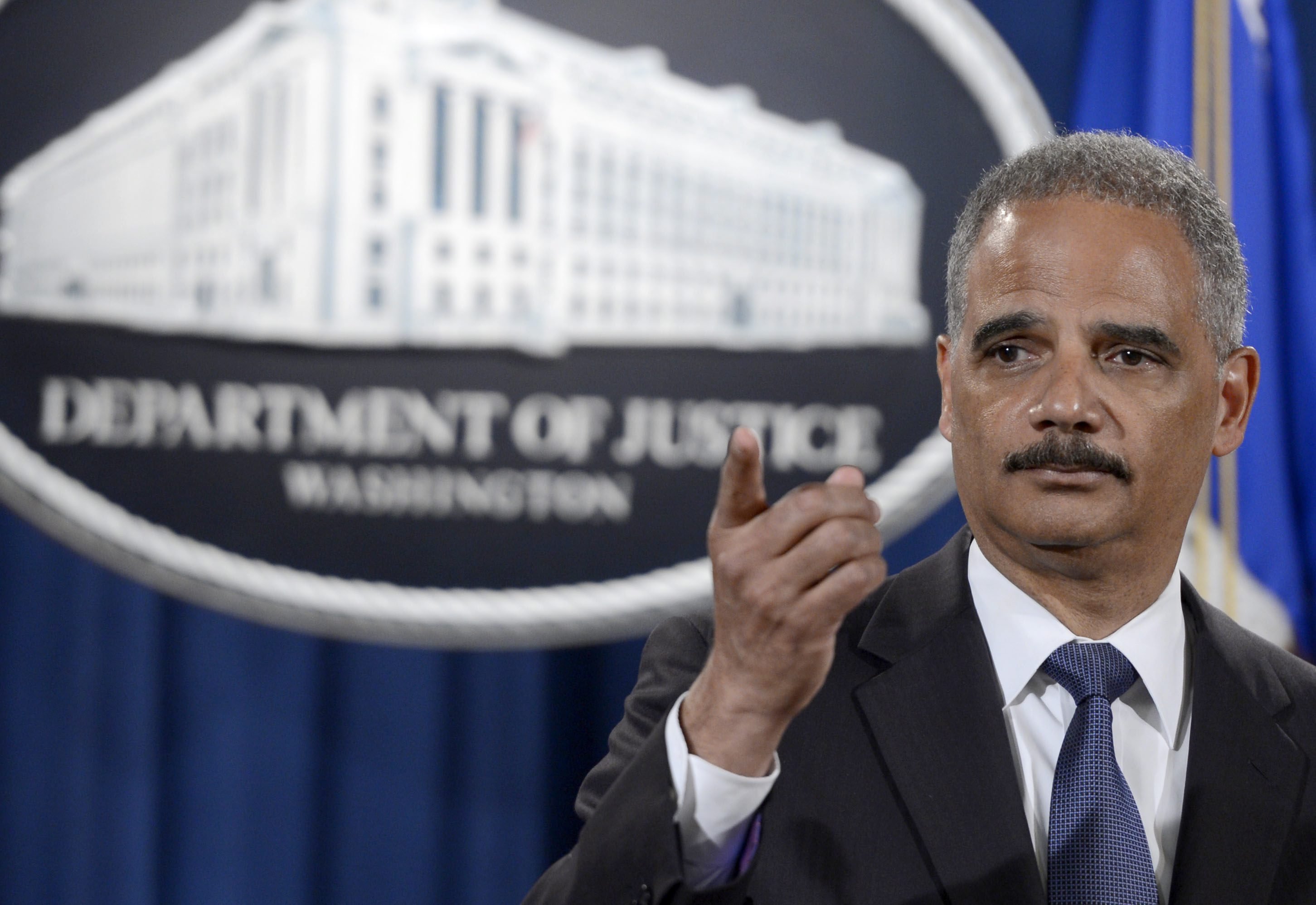 US Attorney General Eric Holder delivers remarks on the Justice Department’s efforts in Ferguson, Missouri.