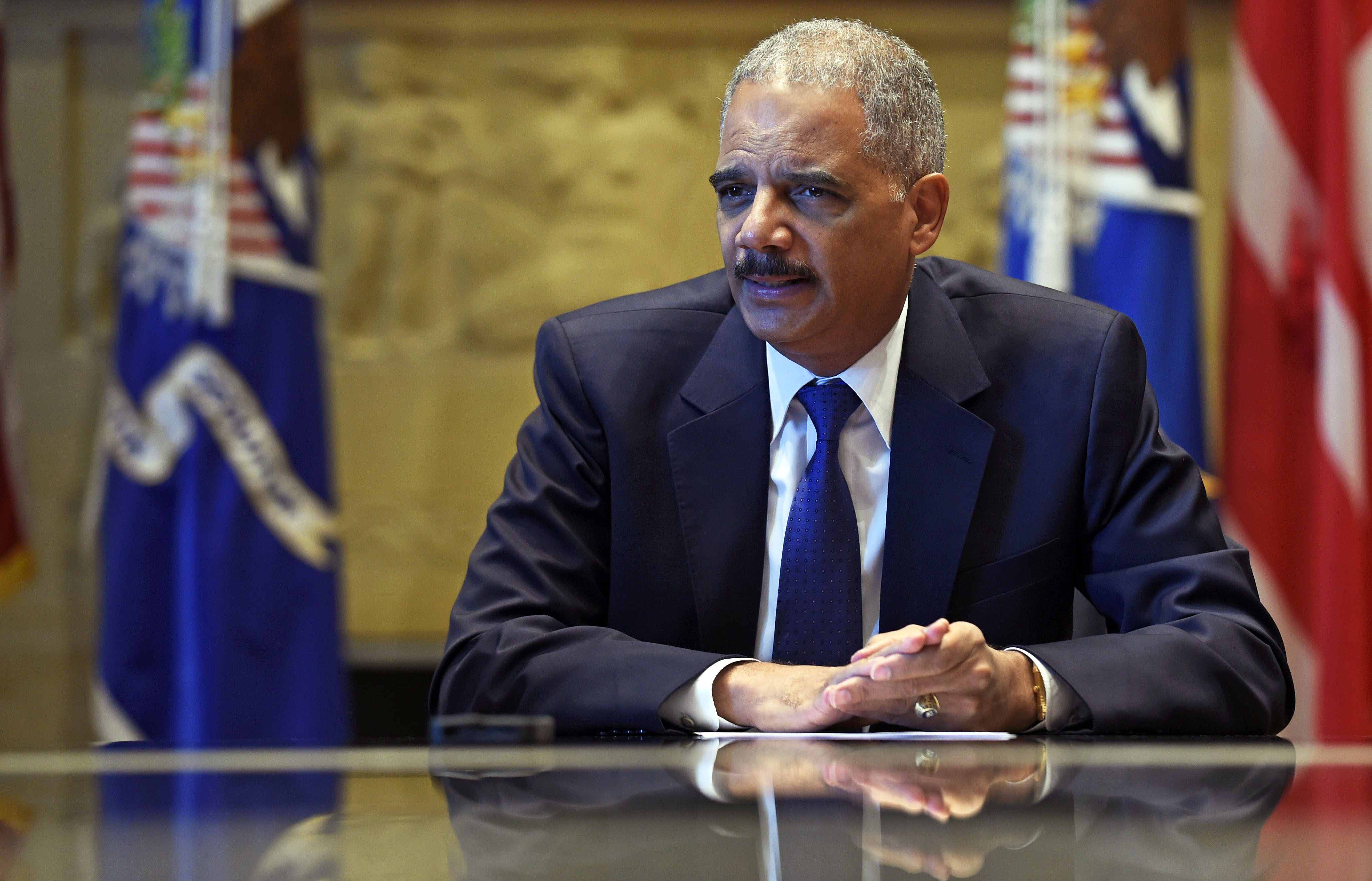Attorney General Eric Holder speaks during an interview with The Associated Press at the Justice Department in Washington, on Sept. 16, 2014. (Susan Walsh—AP)