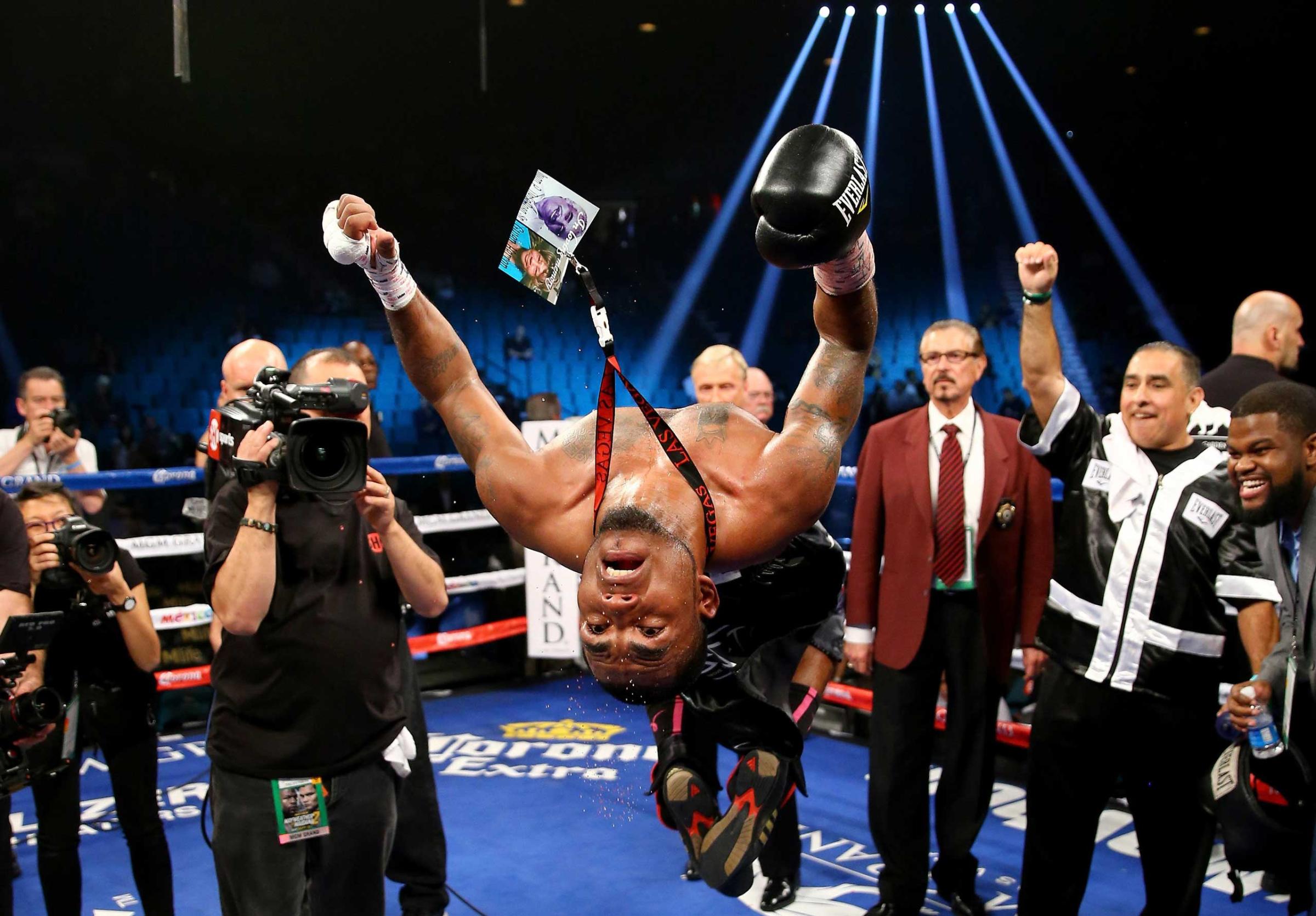 James De la Rosa celebrates his victory against Alfredo Angulo during their middleweight fight at the MGM Grand Garden Arena on Sept. 13, 2014 in Las Vegas.