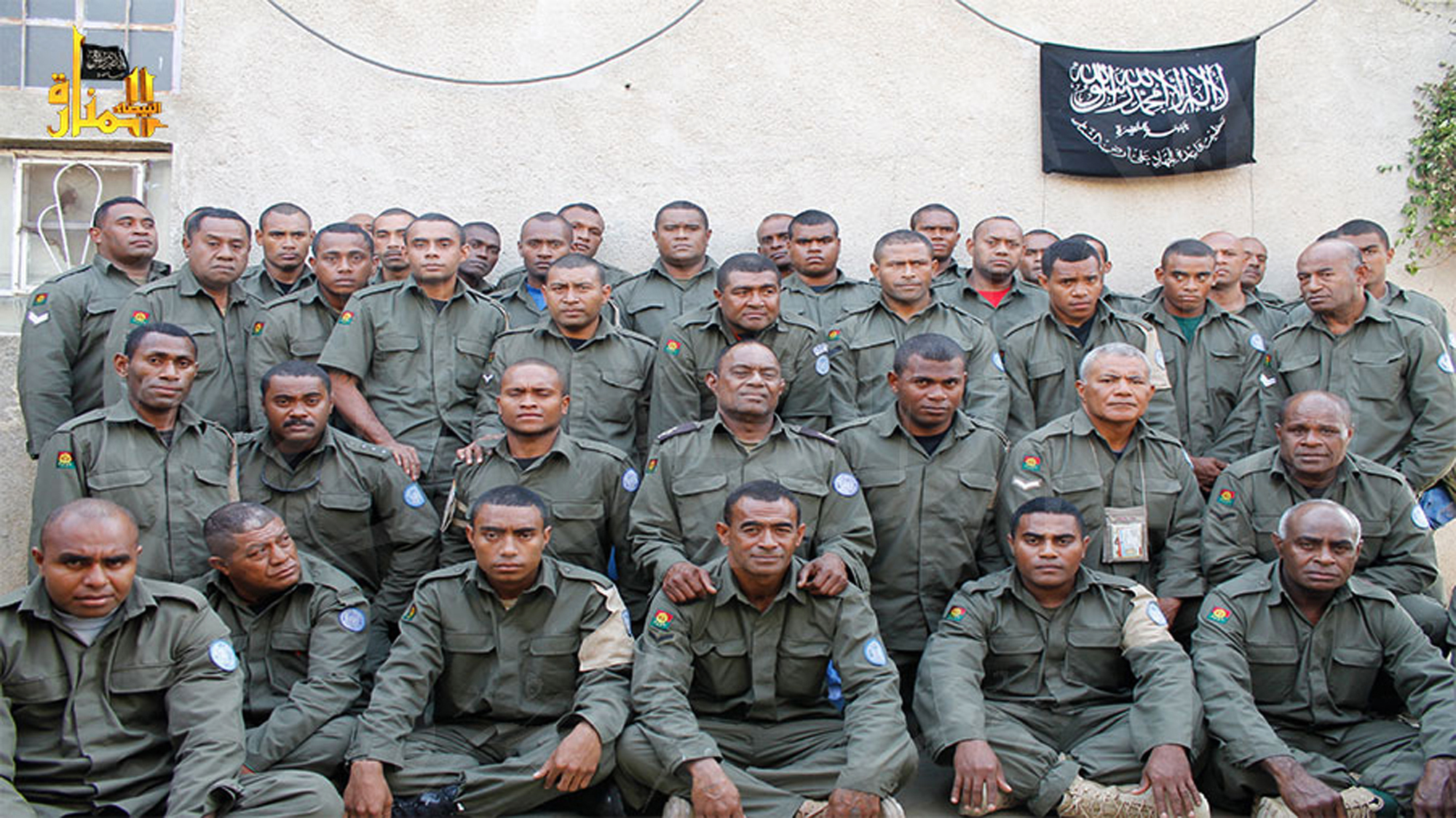 Undated photograph released by Hanin Network, a militant website, shows Fijian UN peacekeepers who were seized by The Nusra Front on Aug. 28, 2014, in the Golan Heights.