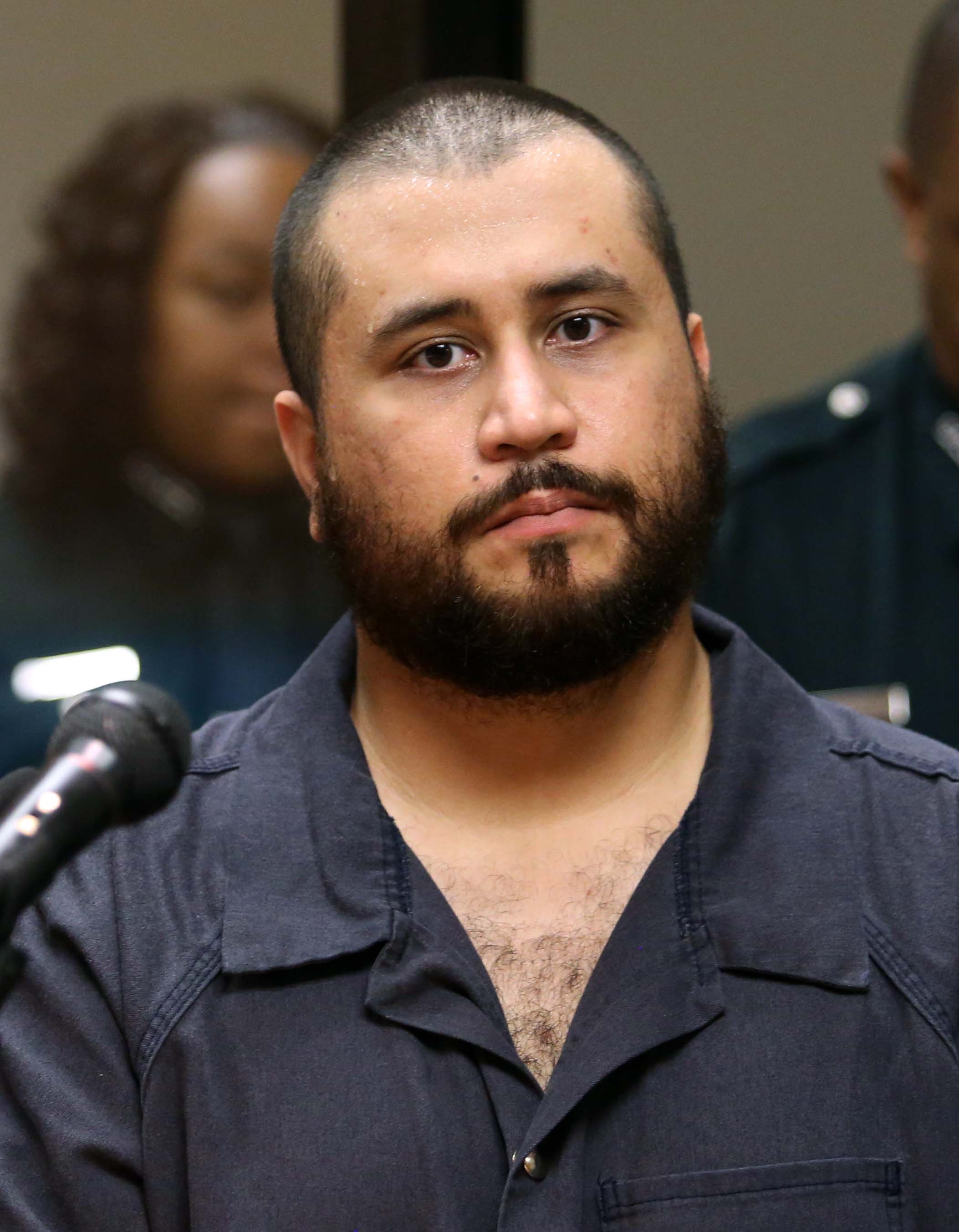 George Zimmerman, the acquitted shooter in the death of Trayvon Martin, faces a Seminole circuit judge during a first-appearance hearing on charges including aggravated assault stemming from a fight with his girlfriend, Nov. 19, 2013 in Sanford, Florida. (Getty Images)