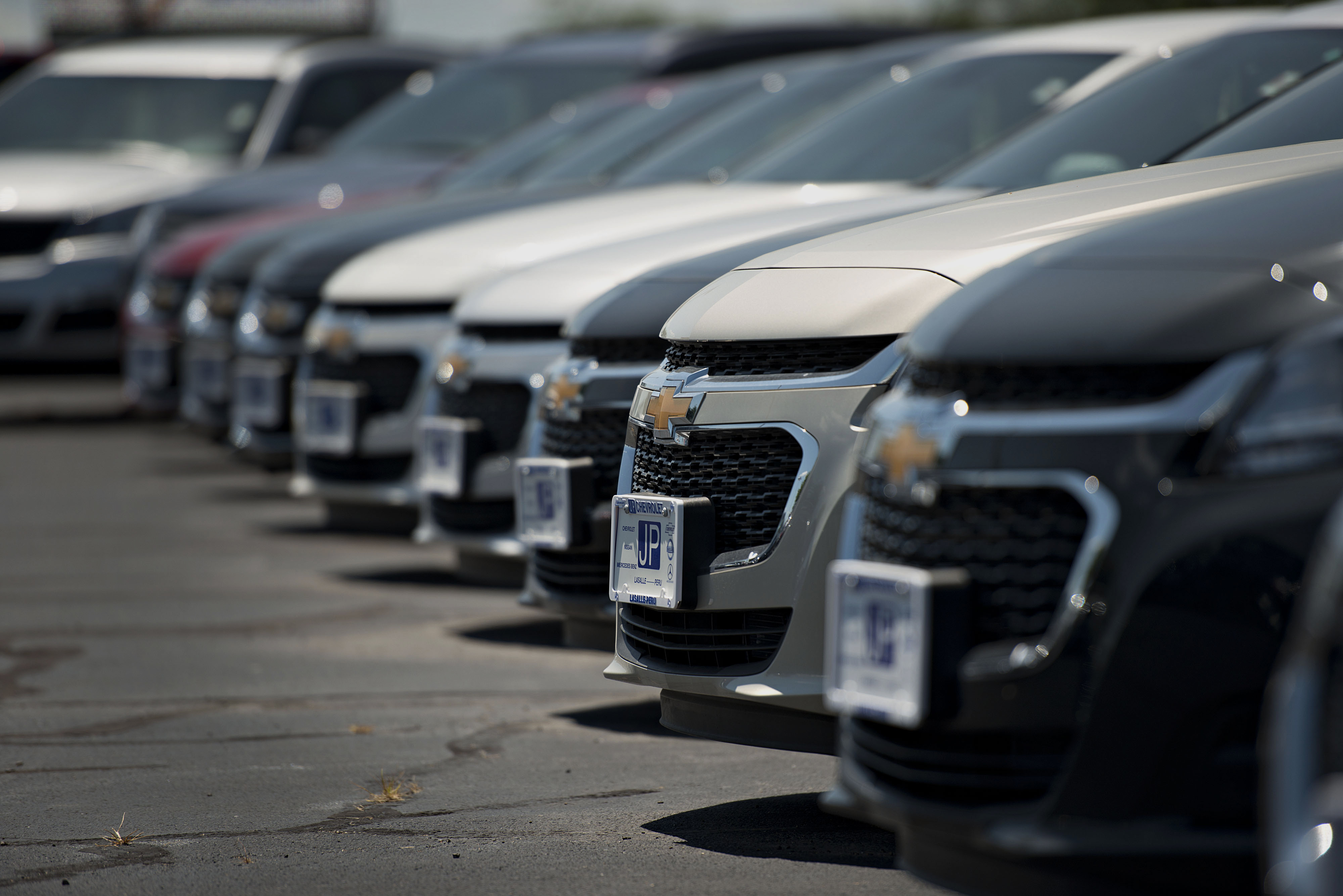 General Motors Co. Chevy Malibu vehicles sit on the lot at JP Chevrolet dealership in Peru, Illinois, U.S., on Wednesday, July 23, 2014. (Daniel Acker—Bloomberg/Getty Images)