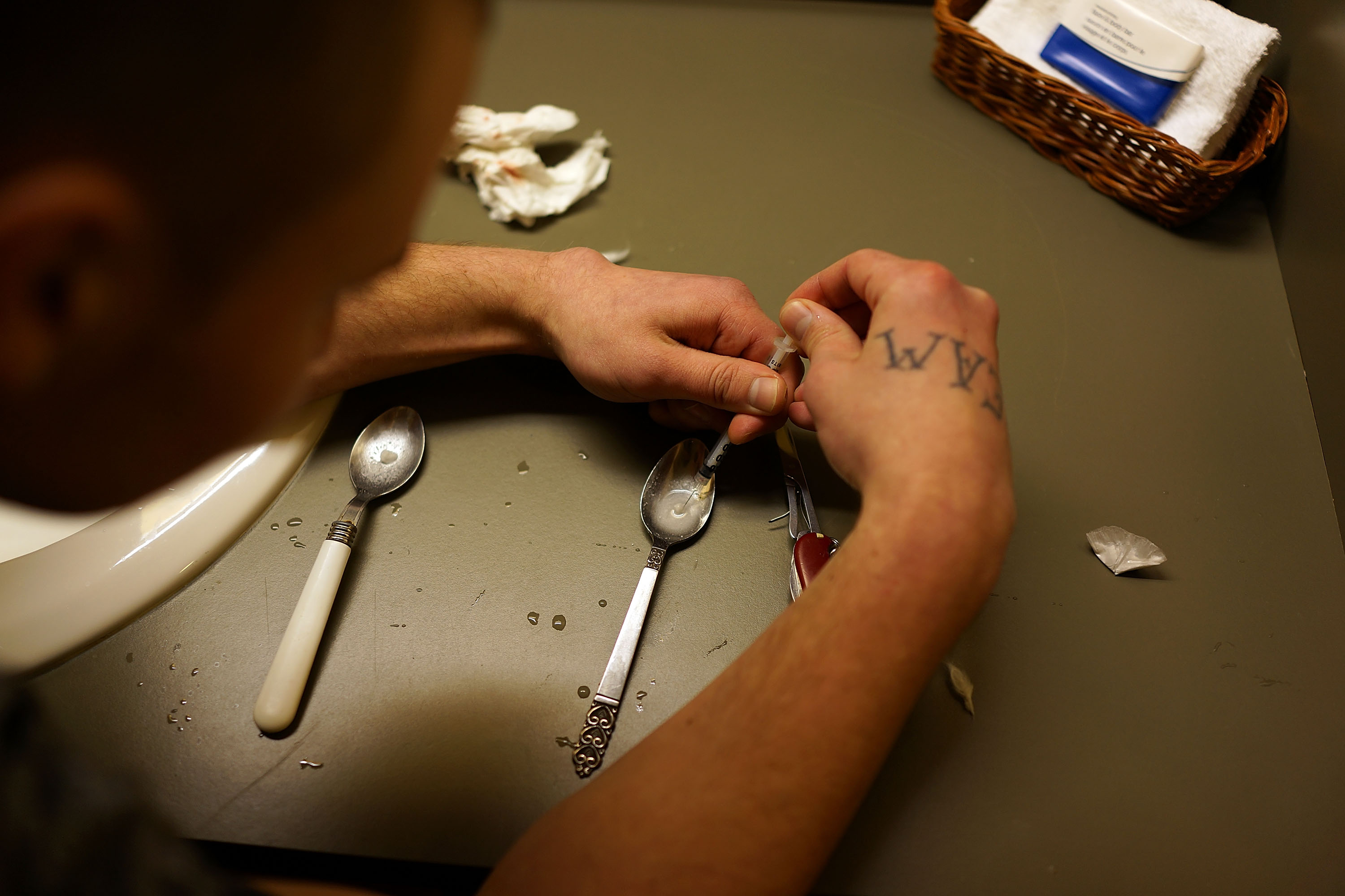 Drugs are prepared to shoot intravenously by a user addicted to heroin on February 6, 2014 in St. Johnsbury Vermont. (Spencer Platt&mdash;Getty Images)