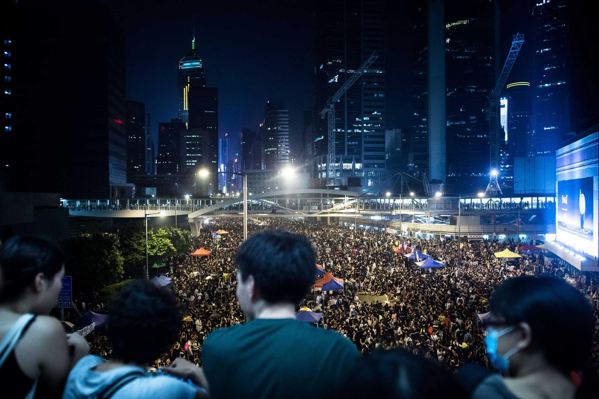 Pro-democracy demonstrators gather for the third night in Hong Kong on Sept. 30, 2014.