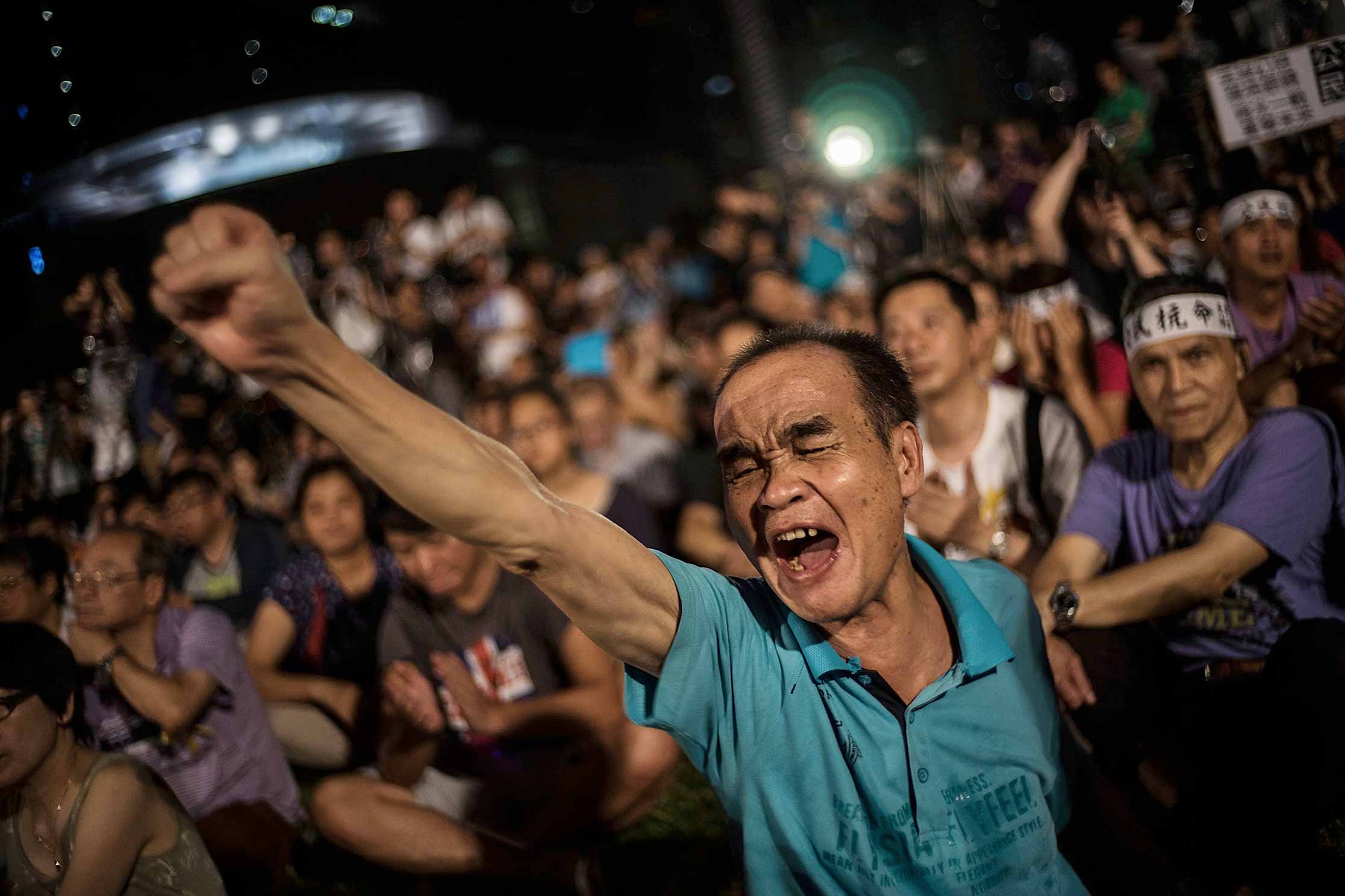 Hong Kong protesters rally outside government offices after Beijing’s Aug. 31 announcement of its election scheme for the territory
