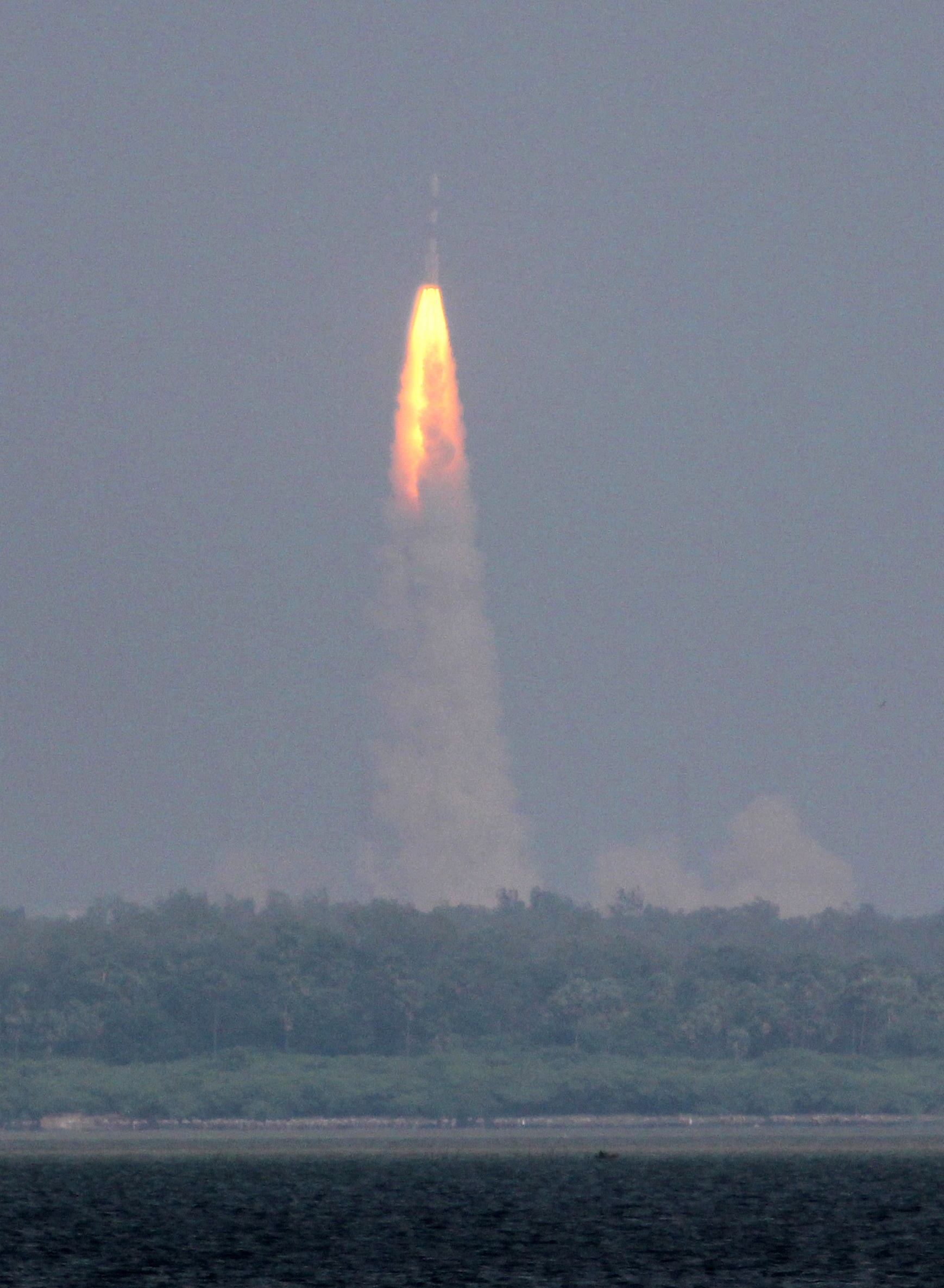 The Polar Satellite Launch Vehicle rocket lifts off carrying India's Mars spacecraft from the east-coast island of Sriharikota, India, Nov. 2013. (Arun Sankar K—AP)