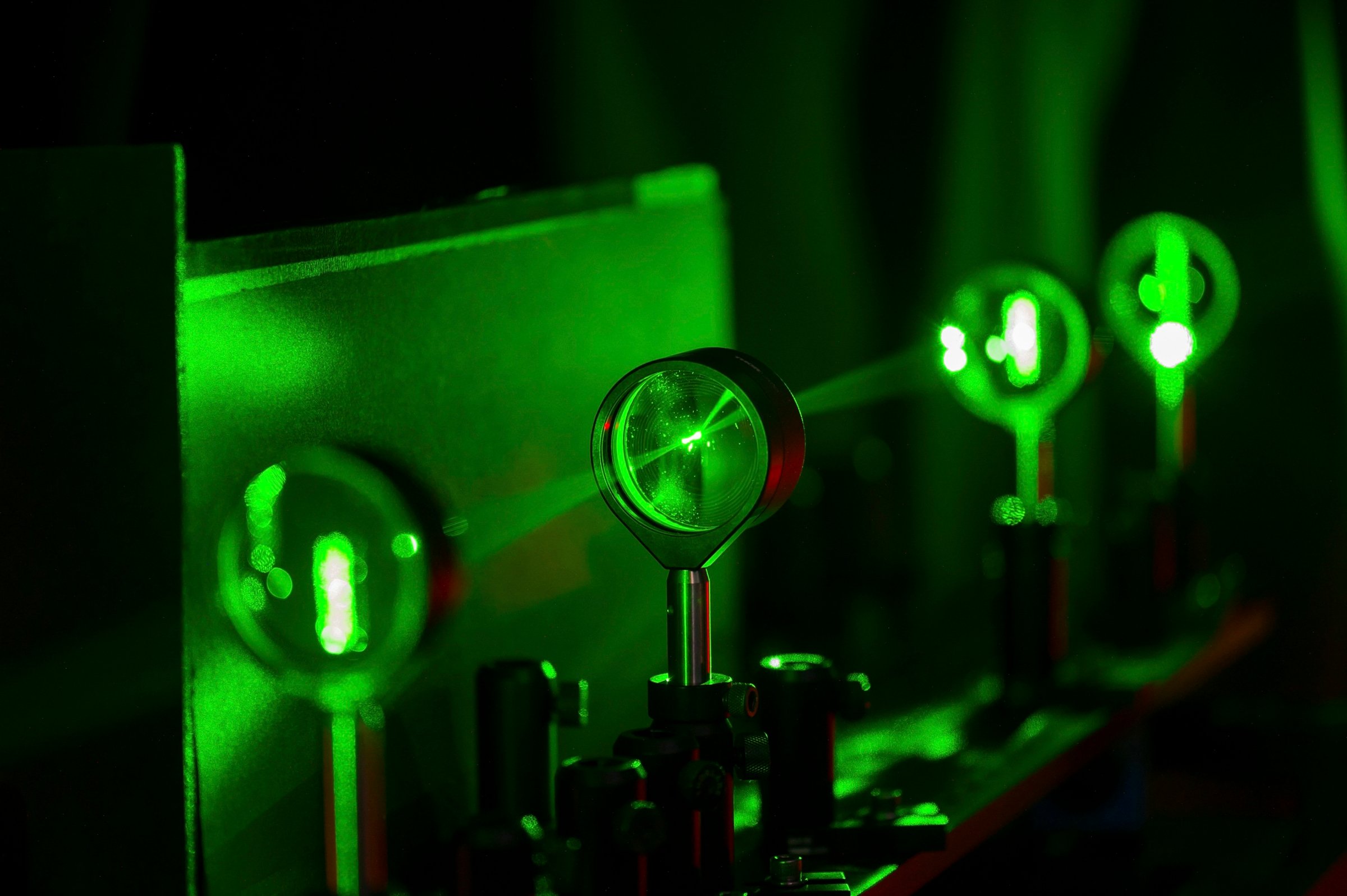 Handout photo of cloaking device using four lenses developed by University of Rochester physics professor Howell and graduate student Choi is demonstrated in Rochester