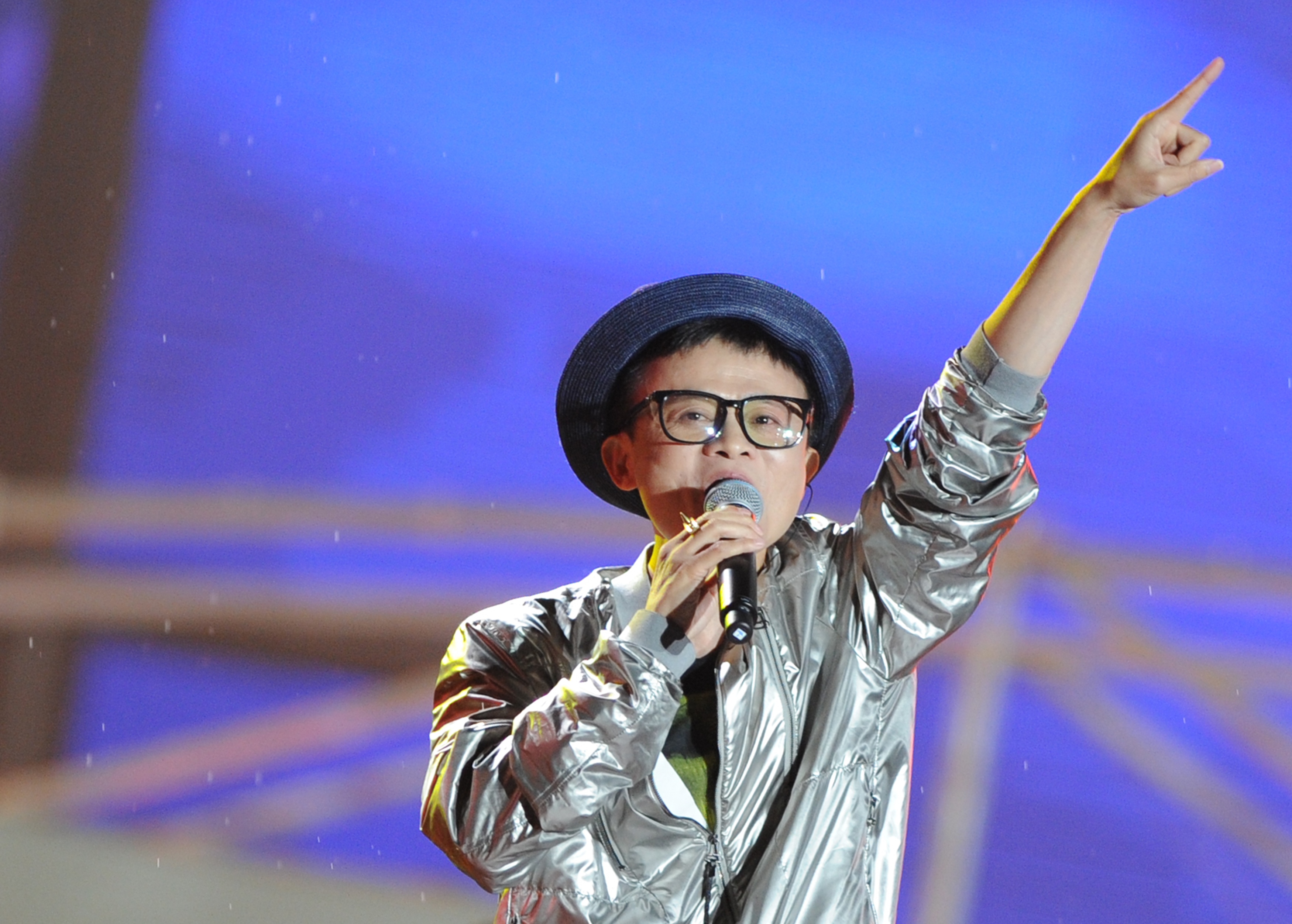 Yes, Ma really does love to sing. His onstage attire was a little less flamboyant by the time this 2013 photo was taken on the 10th anniversary of China's popular Taobao online marketplace, but he is still wearing a silver jacket and what looks like a Kangol.