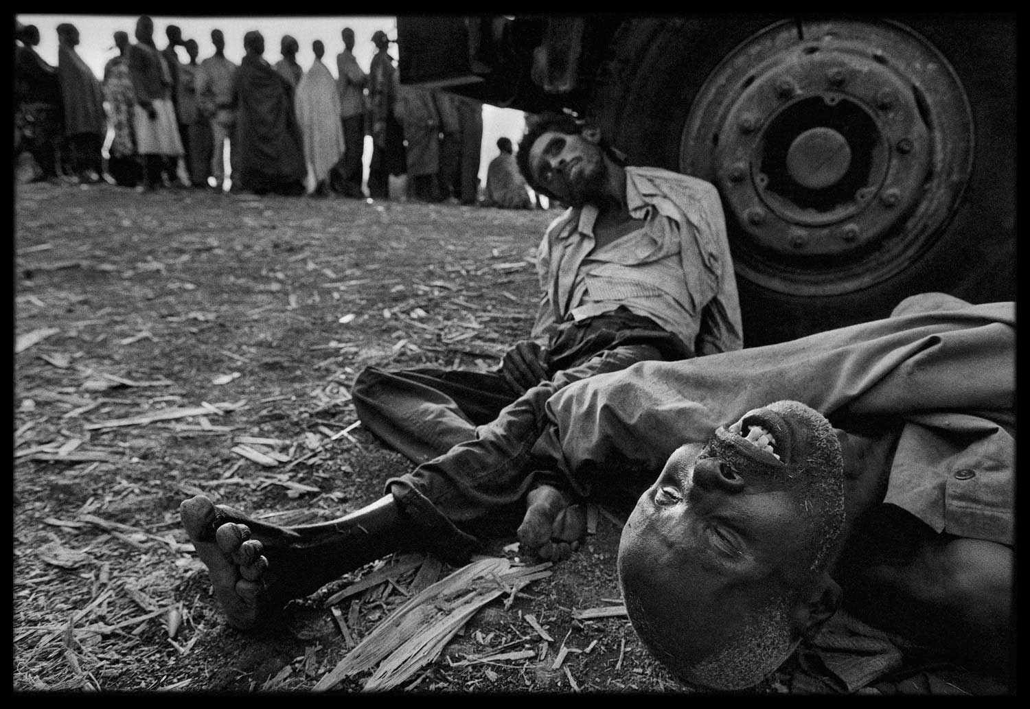 Refugees lined up to receive medical assistance in Zaire. Some died while they waited, Zaire, 1994.