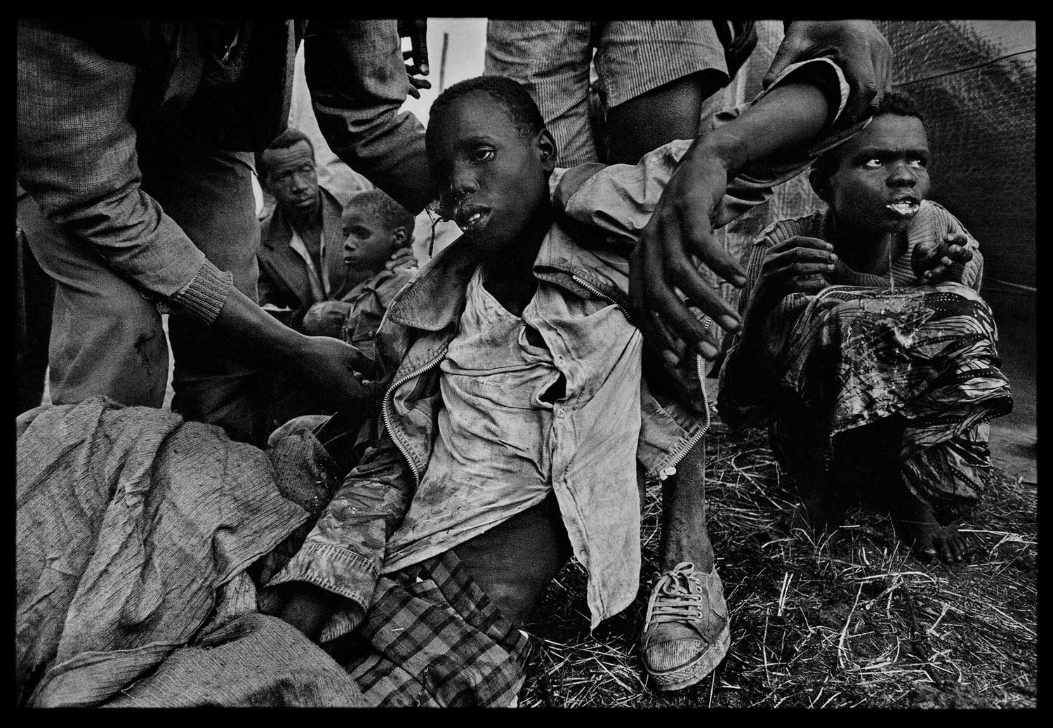 Refugees who had just been hit with cholera were brought to one of the emergency medical stations in Zaire, 1994.