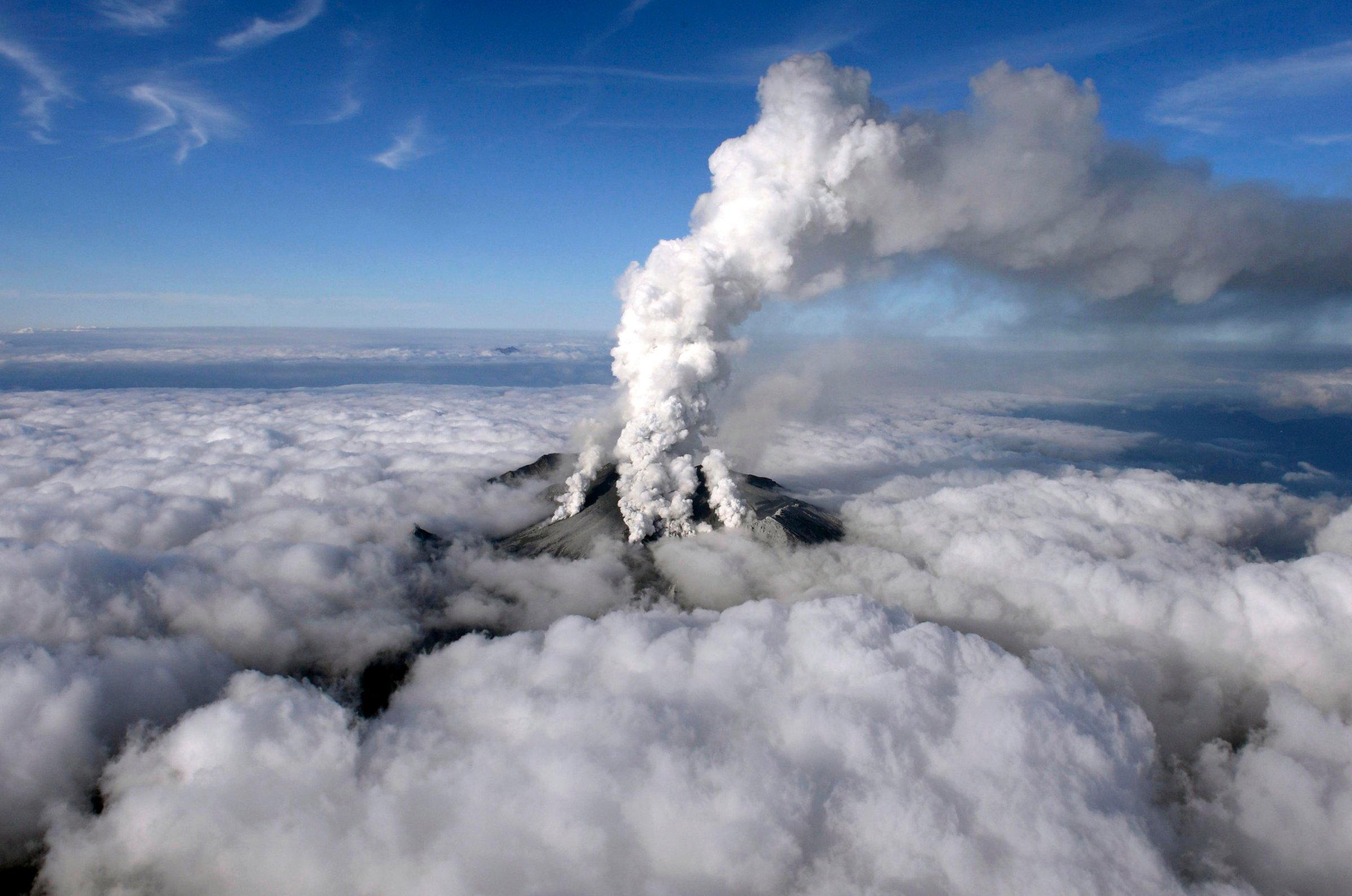 Volcanic smoke rises from Mount Ontake, which straddles Nagano and Gifu prefectures, central Japan on Sept. 27, 2014.