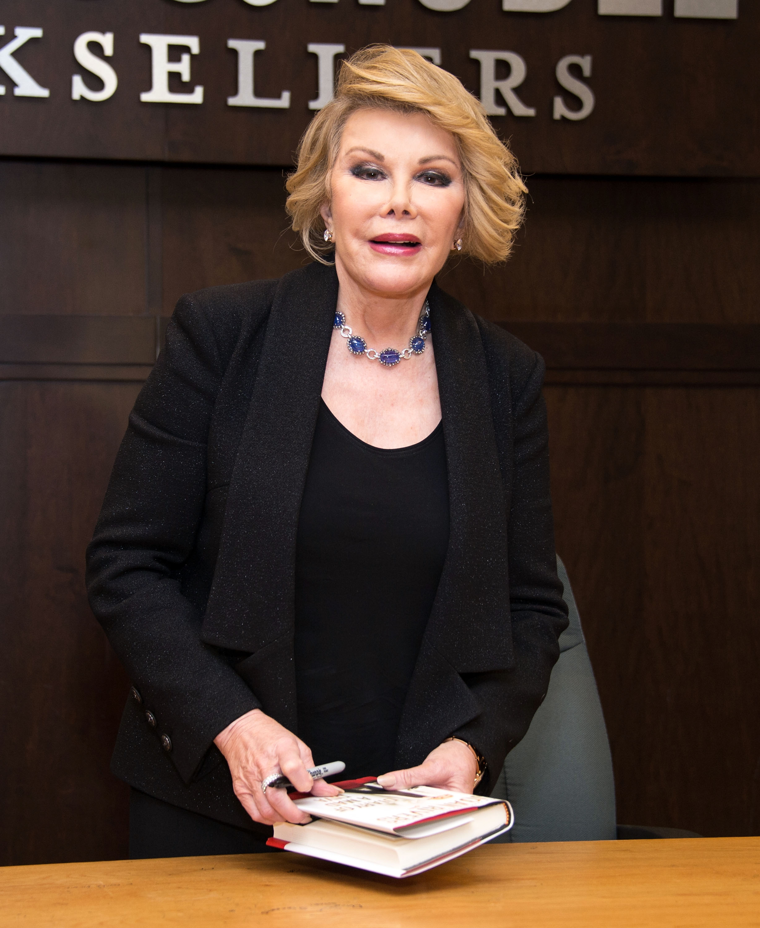 Comedian Joan Rivers poses before signing copies of her new book "Diary Of A Mad Diva" at Barnes &amp; Noble bookstore at The Grove on July 10, 2014 in Los Angeles, California. (Amanda Edwards—WireImage)