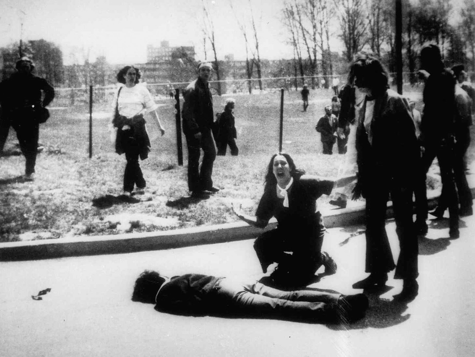 Mary Ann Vecchio kneels by the body of a student lying face down on the campus of Kent State University, Kent, Ohio on May 4, 1970. (John Filo—AP Photo)