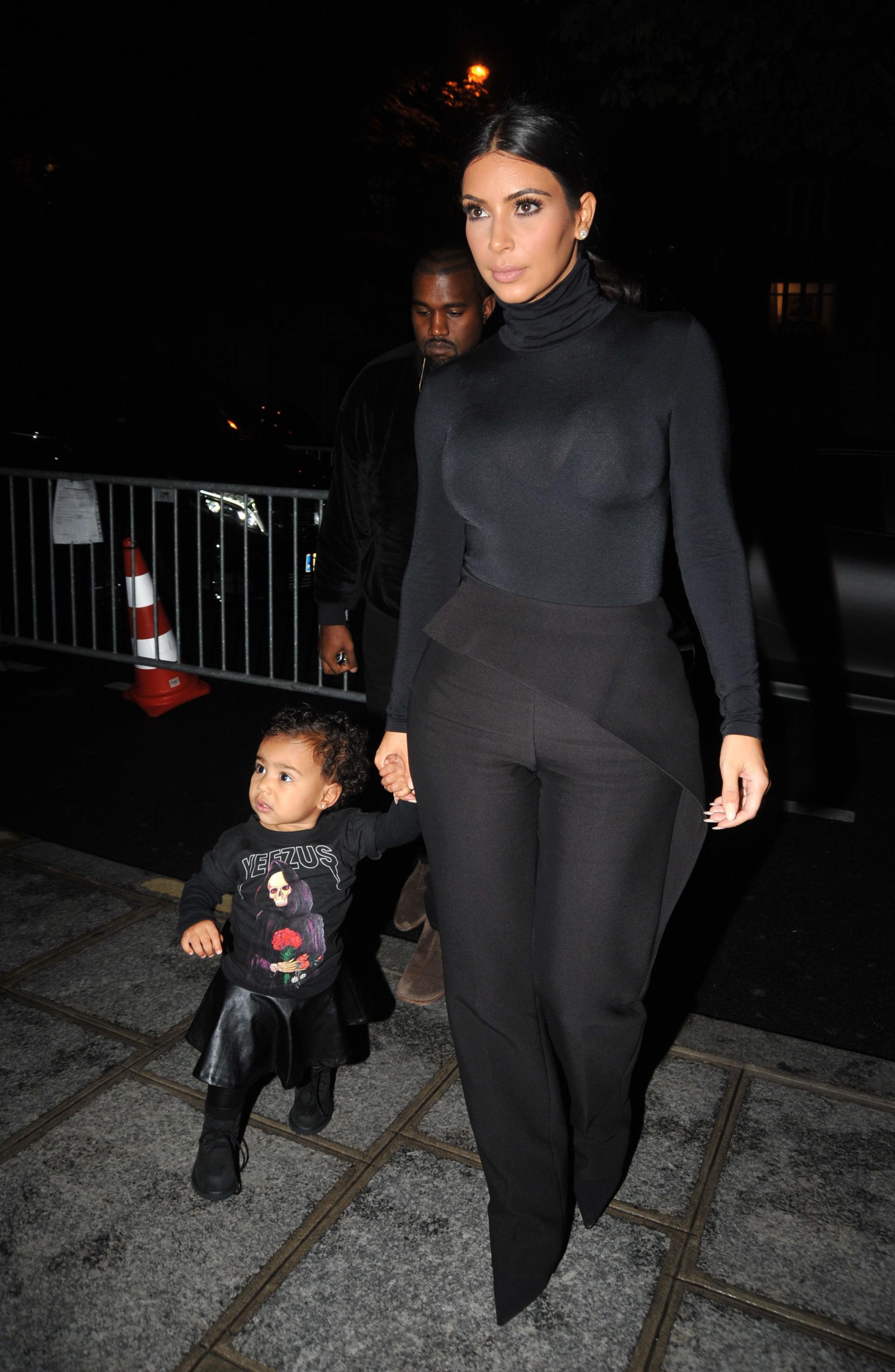 PARIS : Kim Kardashian, Kanye West and North West at the Balenciaga fashion show.
